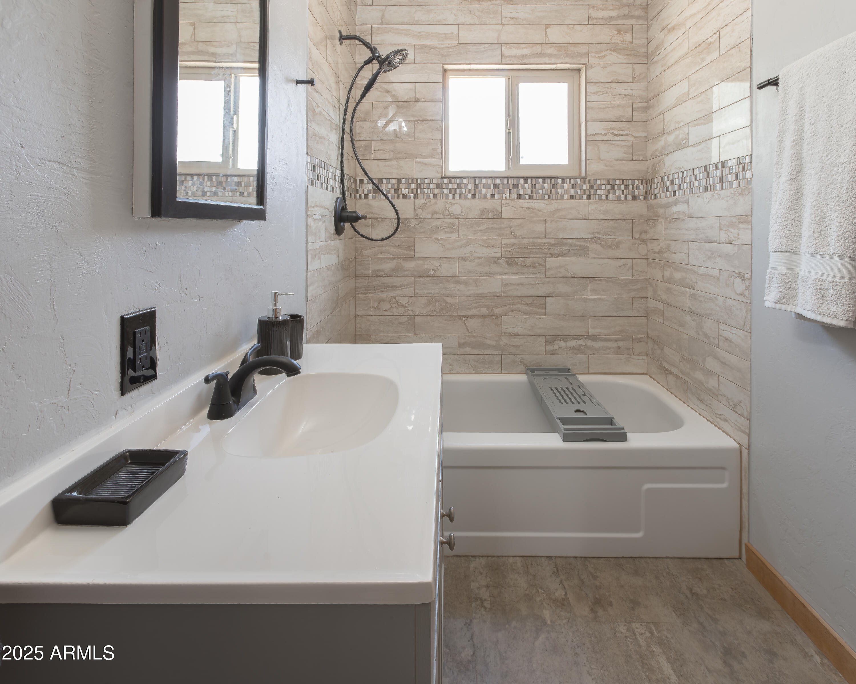 208 Hereford Road Bisbee, AZ 85603 - Photo 27 of 41 a bathroom with a sink a vanity and a mirror