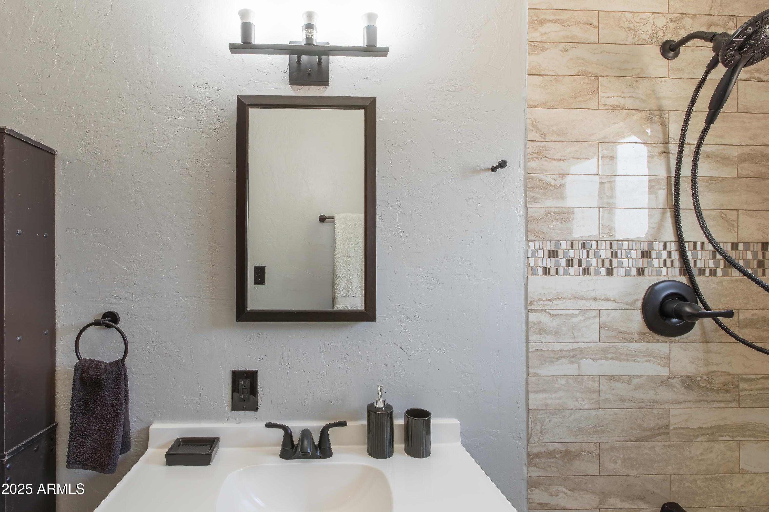 208 Hereford Road Bisbee, AZ 85603 - Photo 28 of 41 a bathroom with a shower
