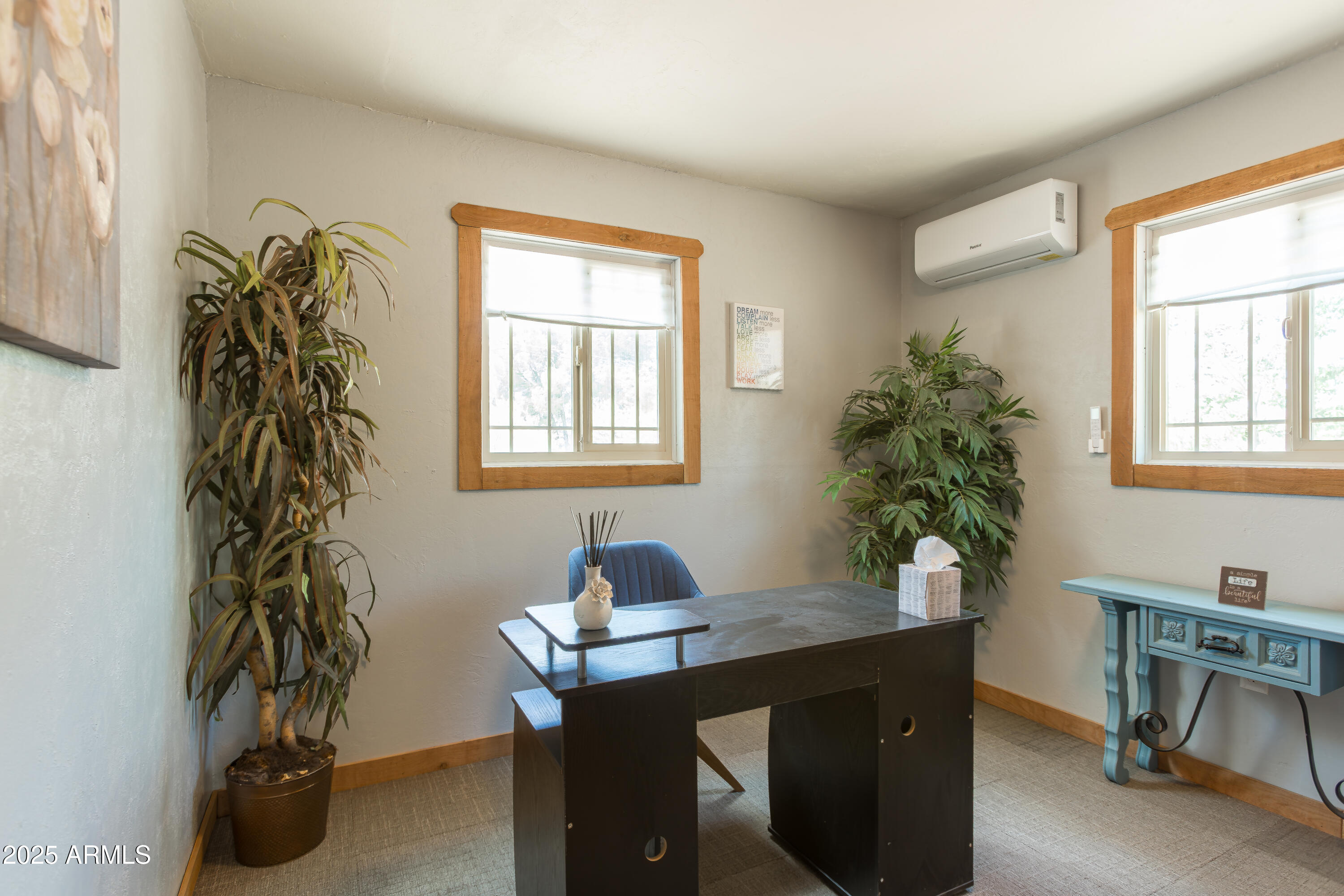 208 Hereford Road Bisbee, AZ 85603 - Photo 31 of 41 a view of a workspace with a window and potted plant