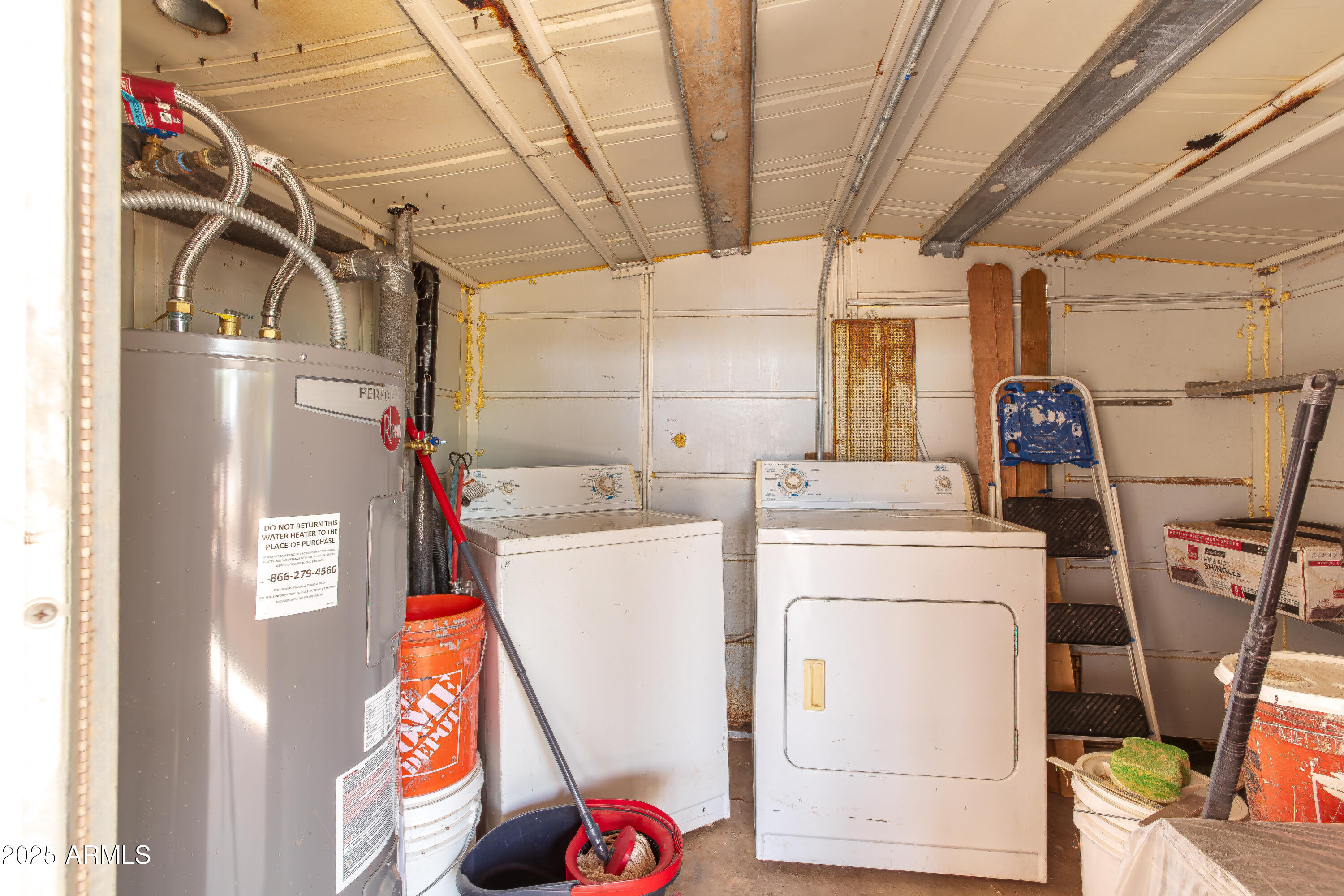 208 Hereford Road Bisbee, AZ 85603 - Photo 35 of 41 a utility room with dryer and washer