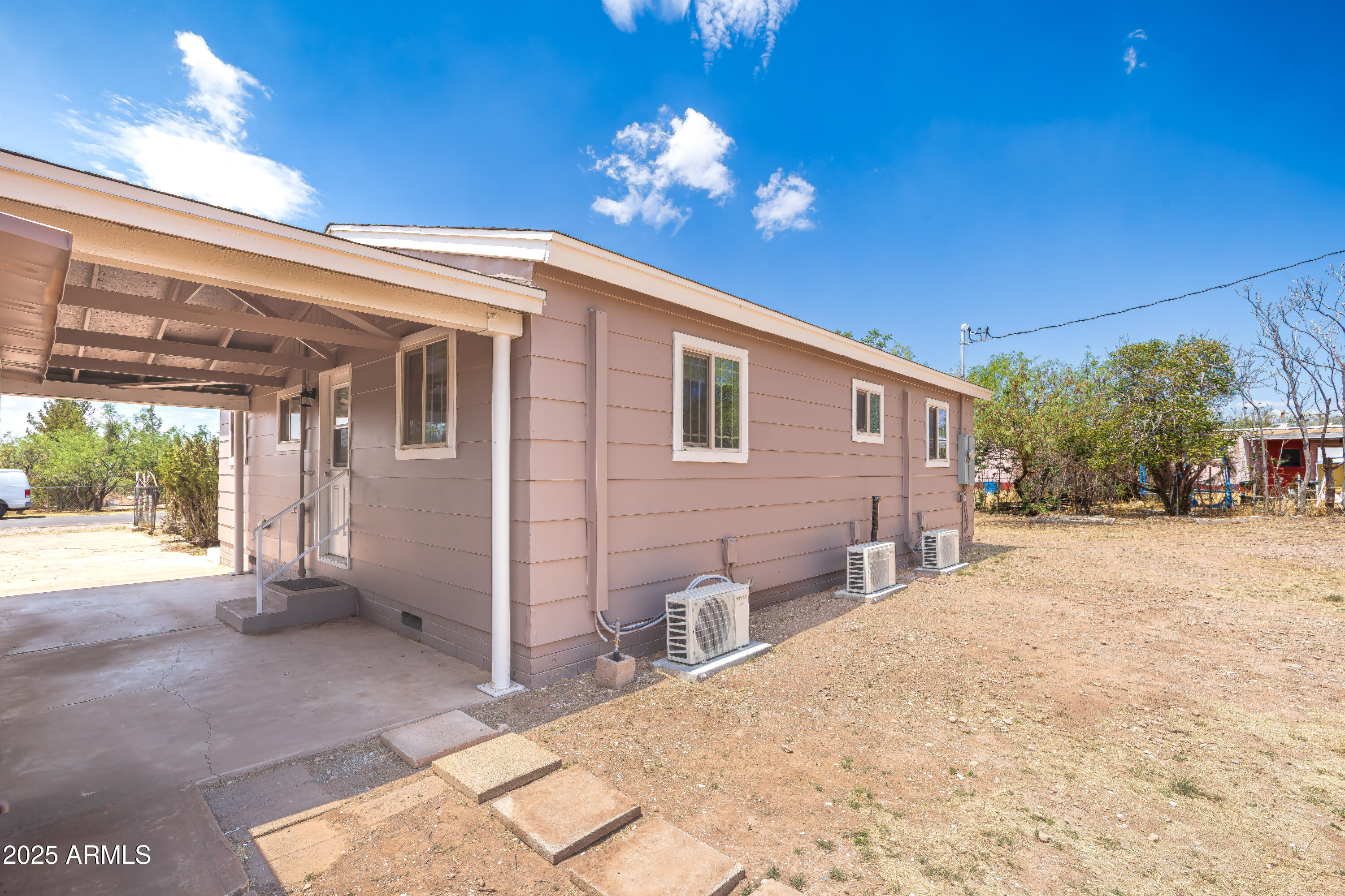 208 Hereford Road Bisbee, AZ 85603 - Photo 36 of 41 a view of a house with a patio