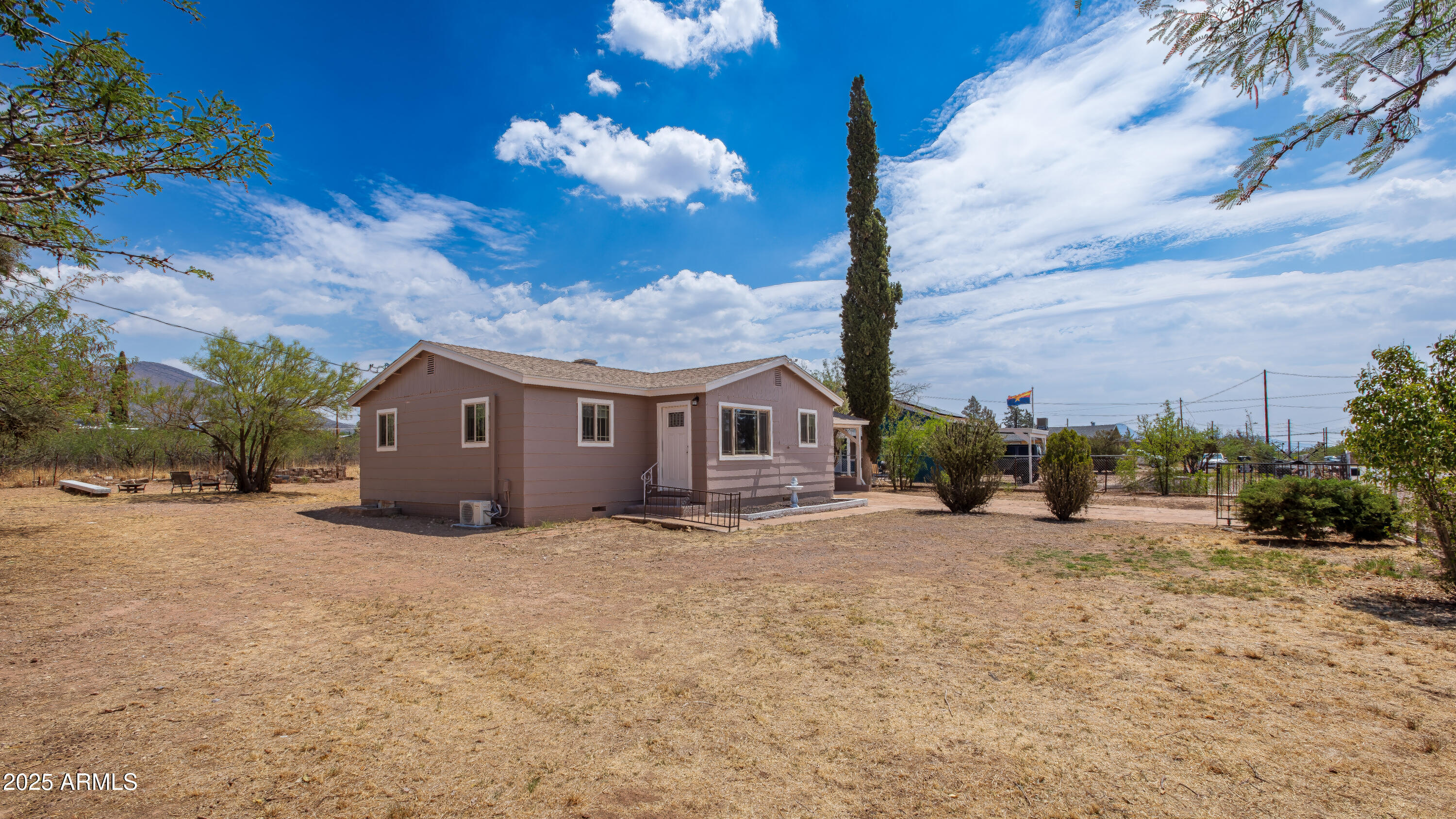 208 Hereford Road Bisbee, AZ 85603 - Photo 5 of 41 a view of a house with a yard