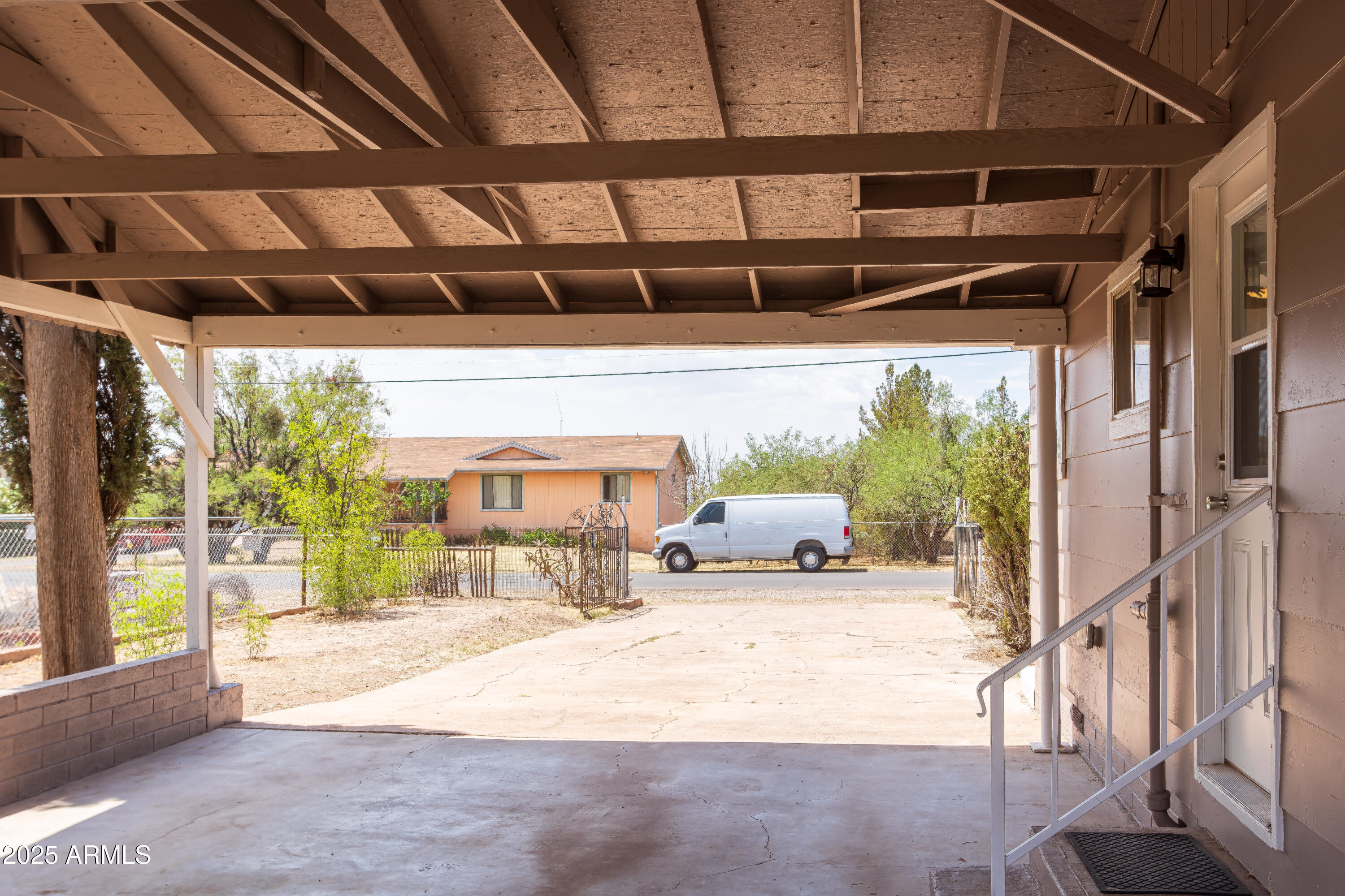 208 Hereford Road Bisbee, AZ 85603 - Photo 6 of 41 a view of a porch