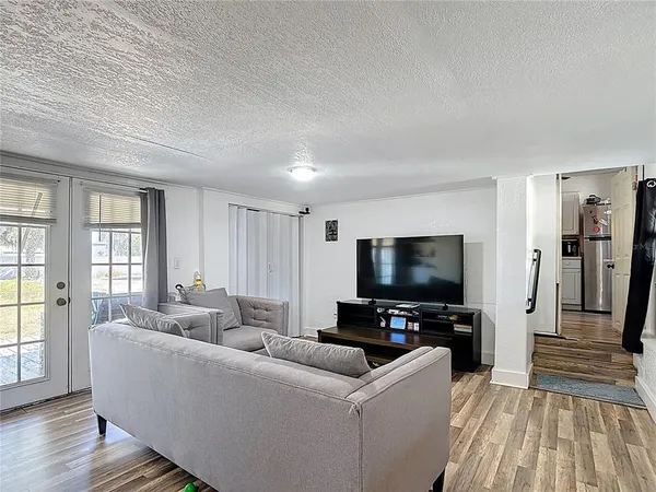 a living room with furniture and a couch