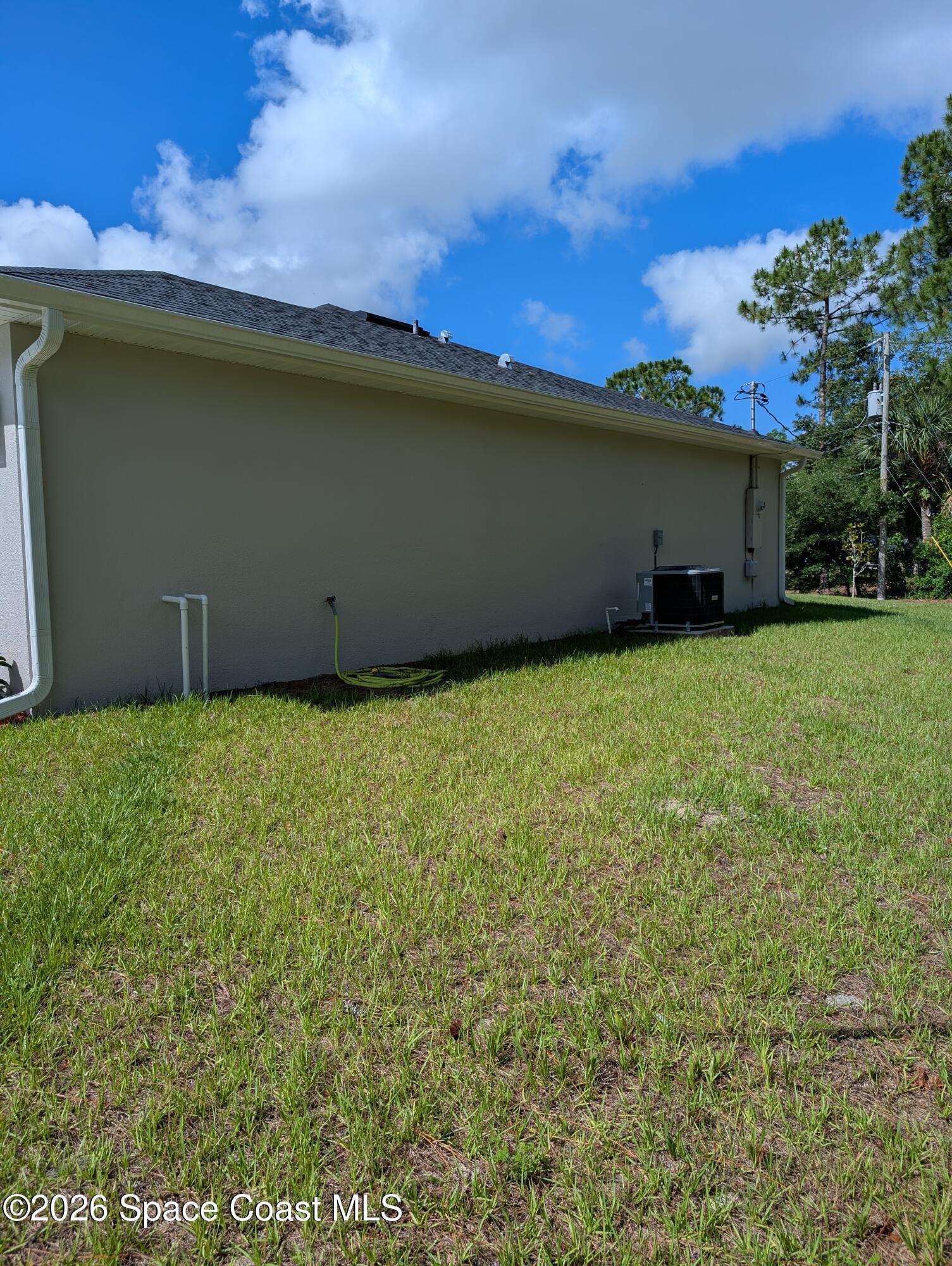1356 Torgerson Road Southeast Palm Bay, FL 32909 - Photo 44 of 46 Side yard