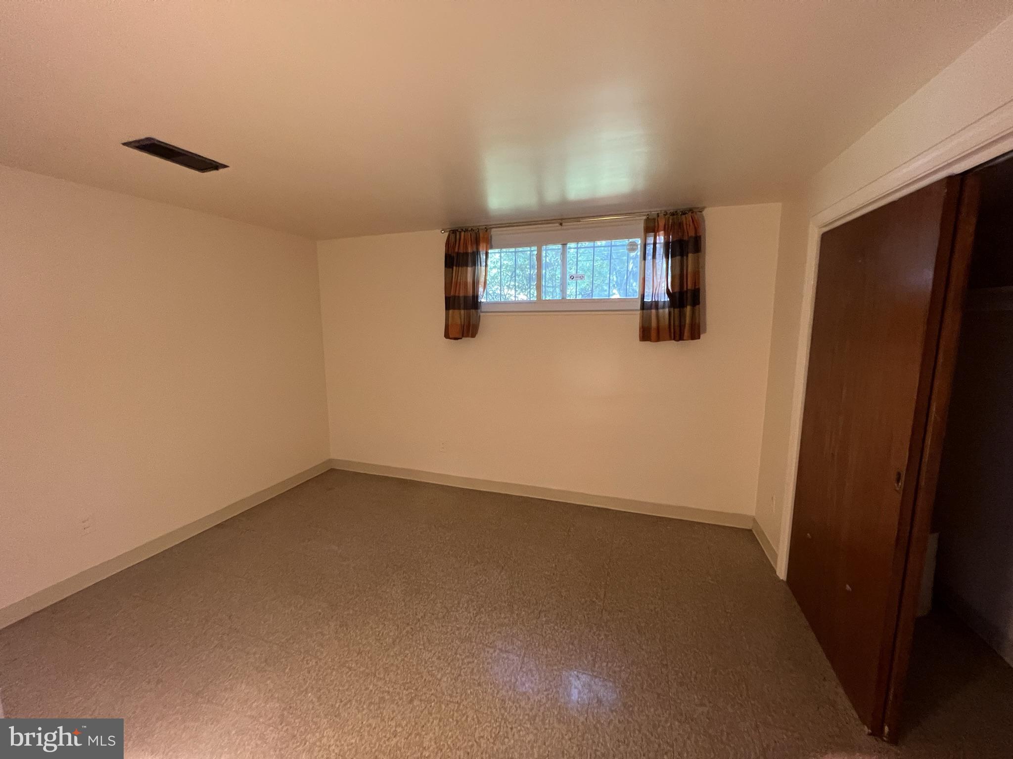 1801 Ladd Street Silver Spring, MD 20902 - Photo 11 of 16 Basement bedroom