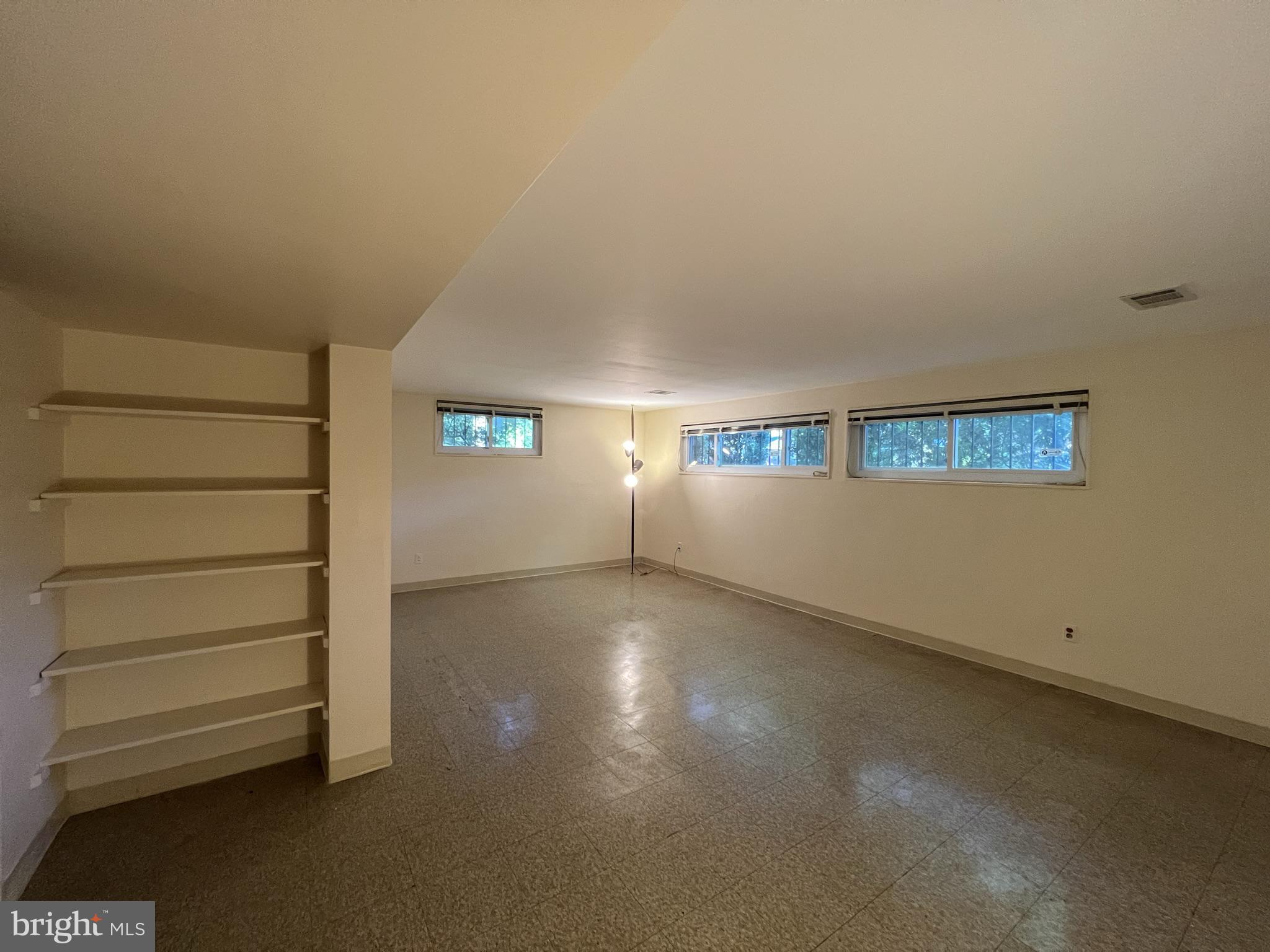 1801 Ladd Street Silver Spring, MD 20902 - Photo 13 of 16 Family room in basement with great daylight access