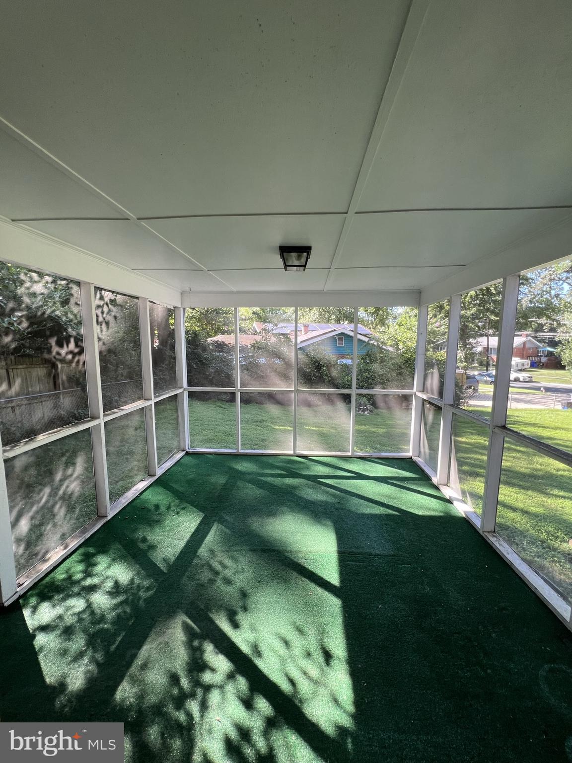 1801 Ladd Street Silver Spring, MD 20902 - Photo 5 of 16 Enjoy a relaxing time in the screened porch.