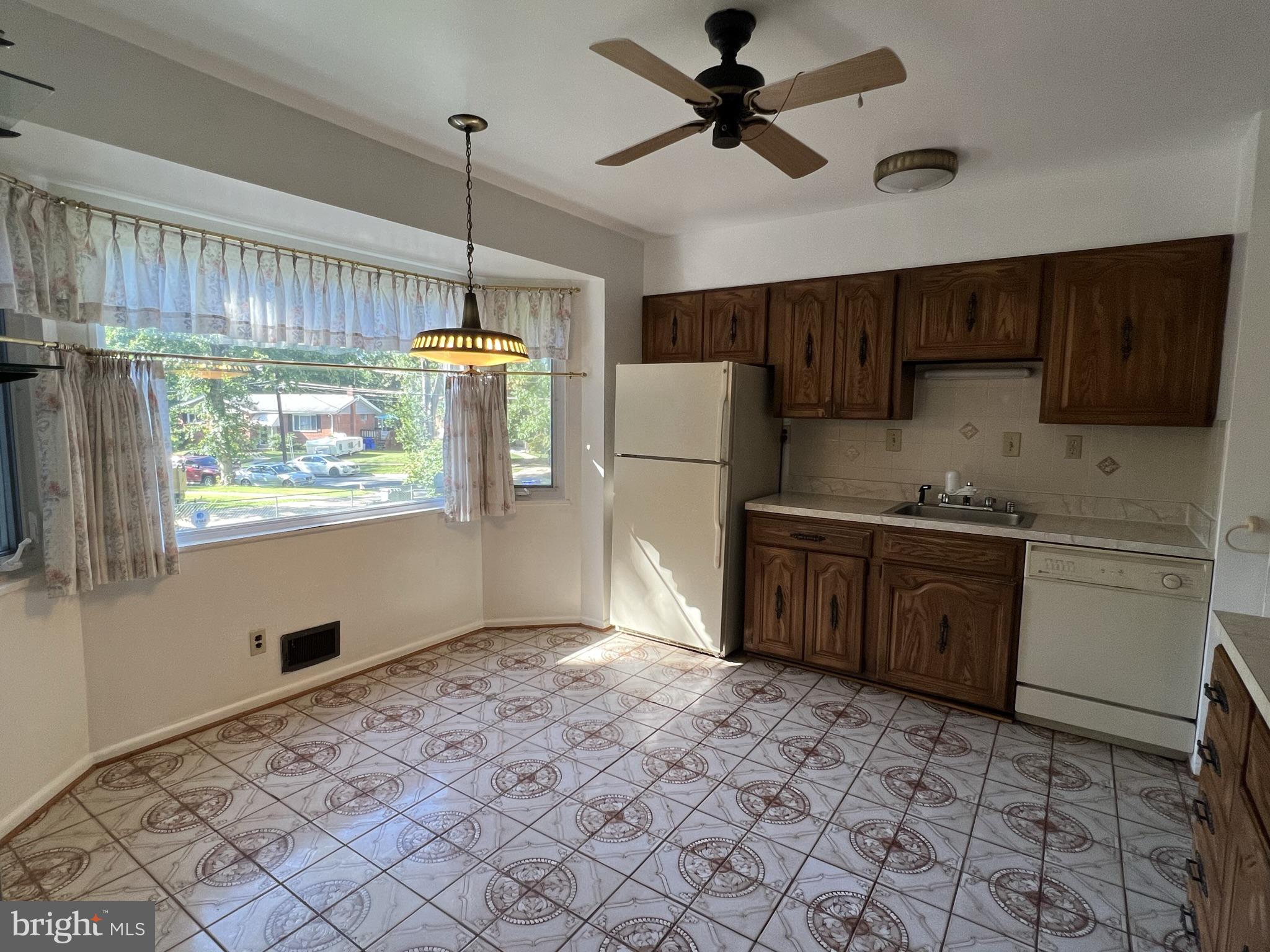 1801 Ladd Street Silver Spring, MD 20902 - Photo 6 of 16 Bright and open, table space kitchen.