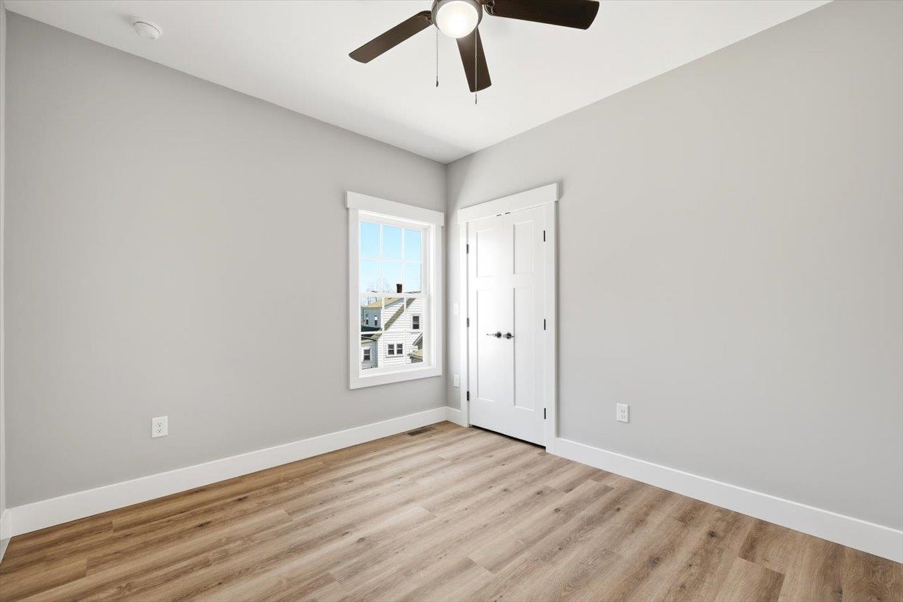 103 Hilltop Terrace Road Staunton, VA 24401 - Photo 25 of 47 an empty room with wooden floor and ceiling fan