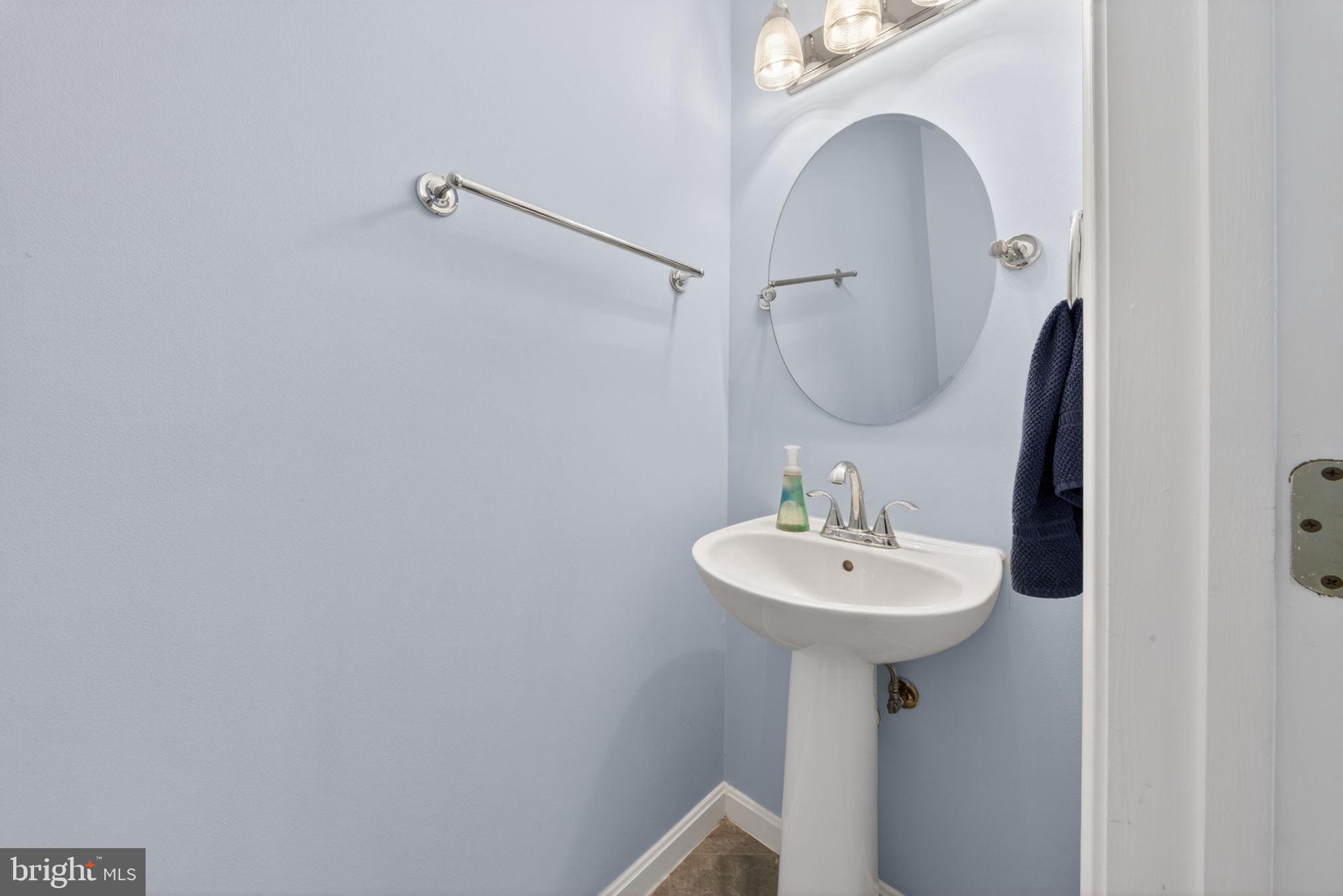 6006 Lincolnia Road Alexandria, VA 22312 - Photo 17 of 42 Charming powder room with serene hues.