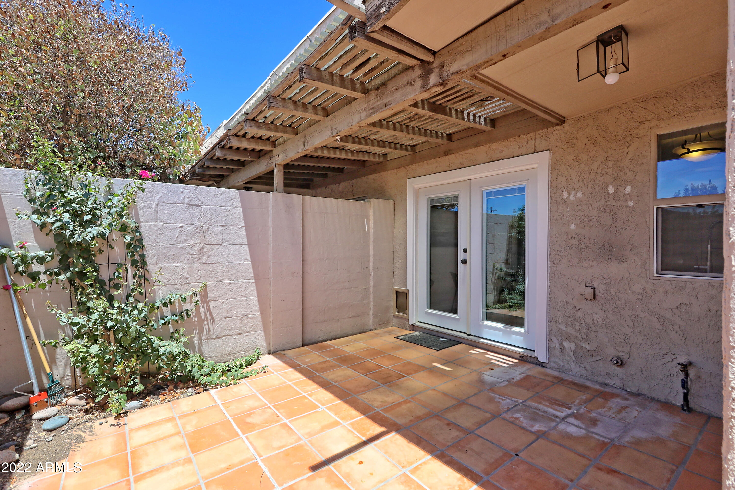 6348 North 7th Avenue, Unit 12 Phoenix, AZ 85013 - Photo 12 of 22 a view of a backyard