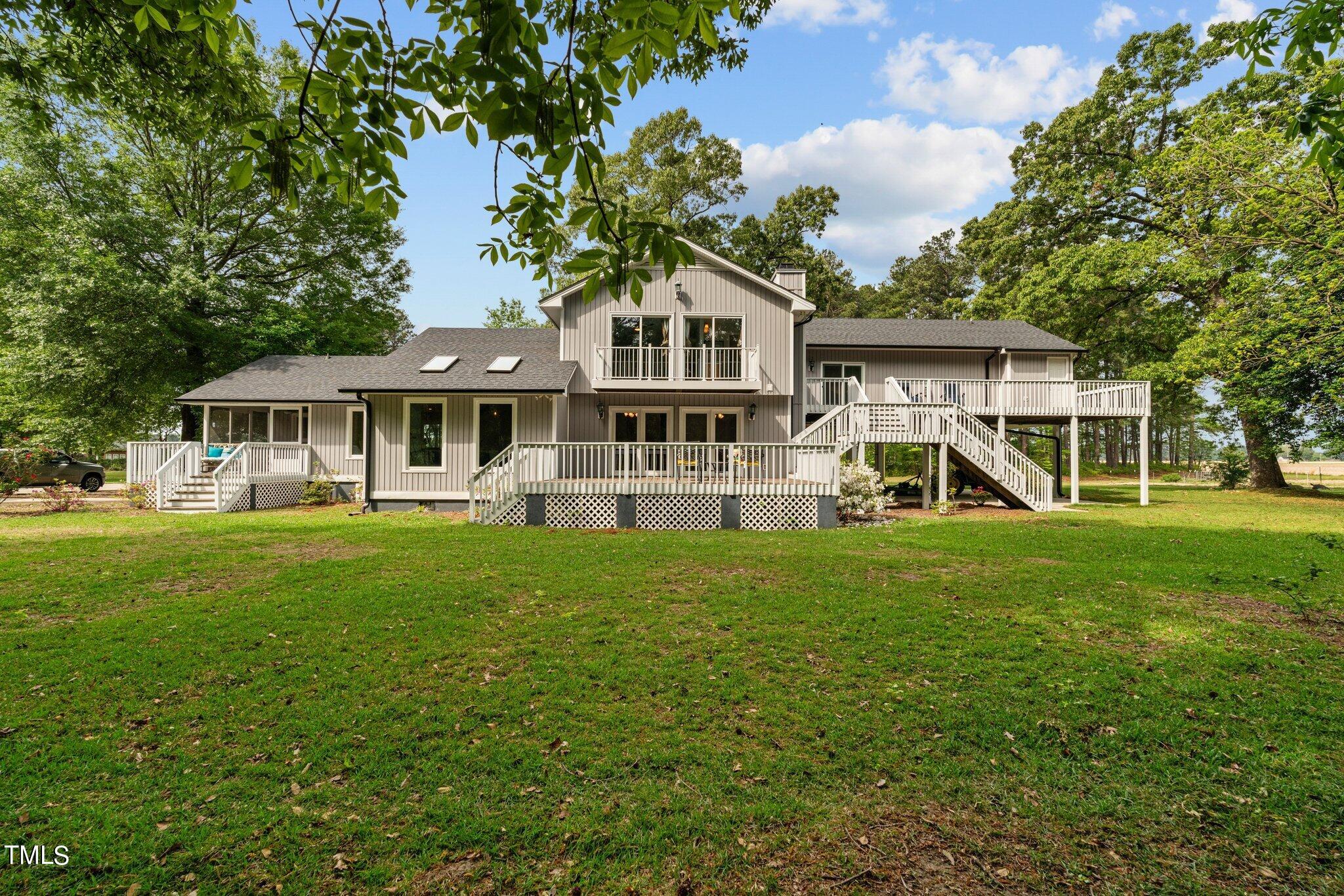 744 Alderman Mill Road Dunn, NC 28334 - Photo 1 of 50 a front view of a house with a yard