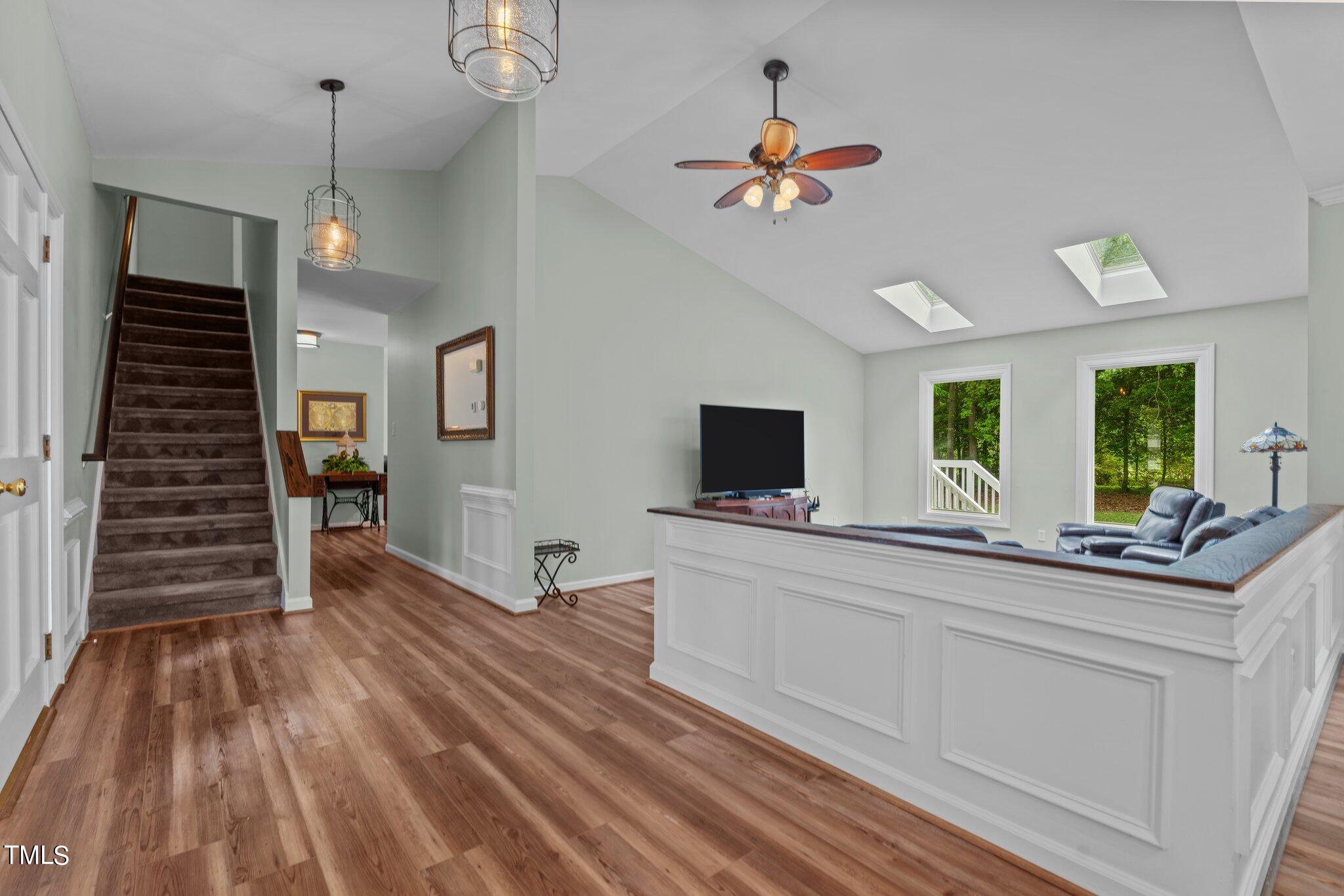 744 Alderman Mill Road Dunn, NC 28334 - Photo 12 of 50 a view of a livingroom with kitchen and furniture