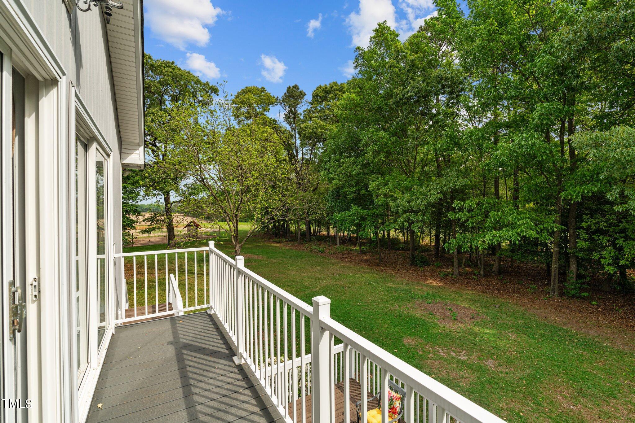 744 Alderman Mill Road Dunn, NC 28334 - Photo 36 of 50 a view of a balcony with lake view