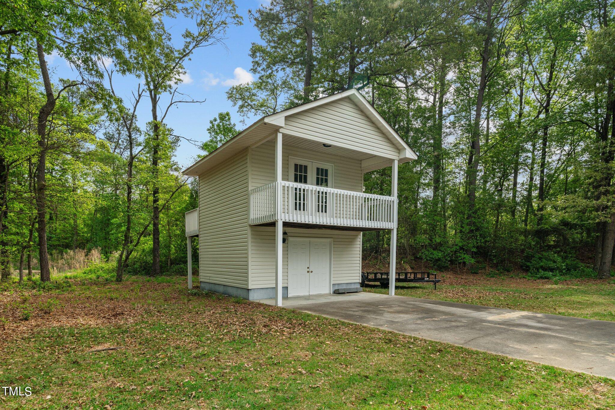 744 Alderman Mill Road Dunn, NC 28334 - Photo 39 of 50 front view of a house with a yard