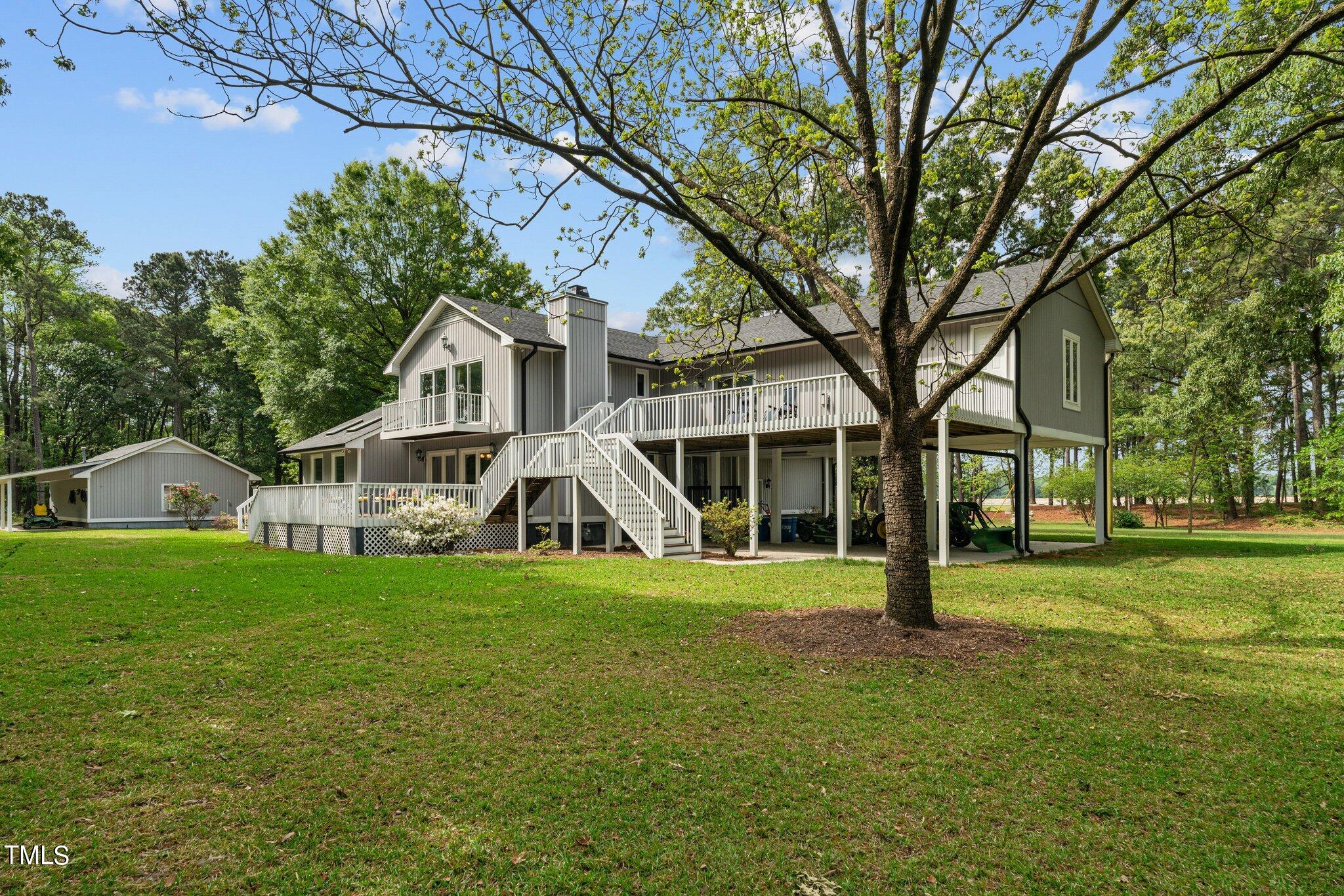744 Alderman Mill Road Dunn, NC 28334 - Photo 44 of 50 a front view of a house with a yard