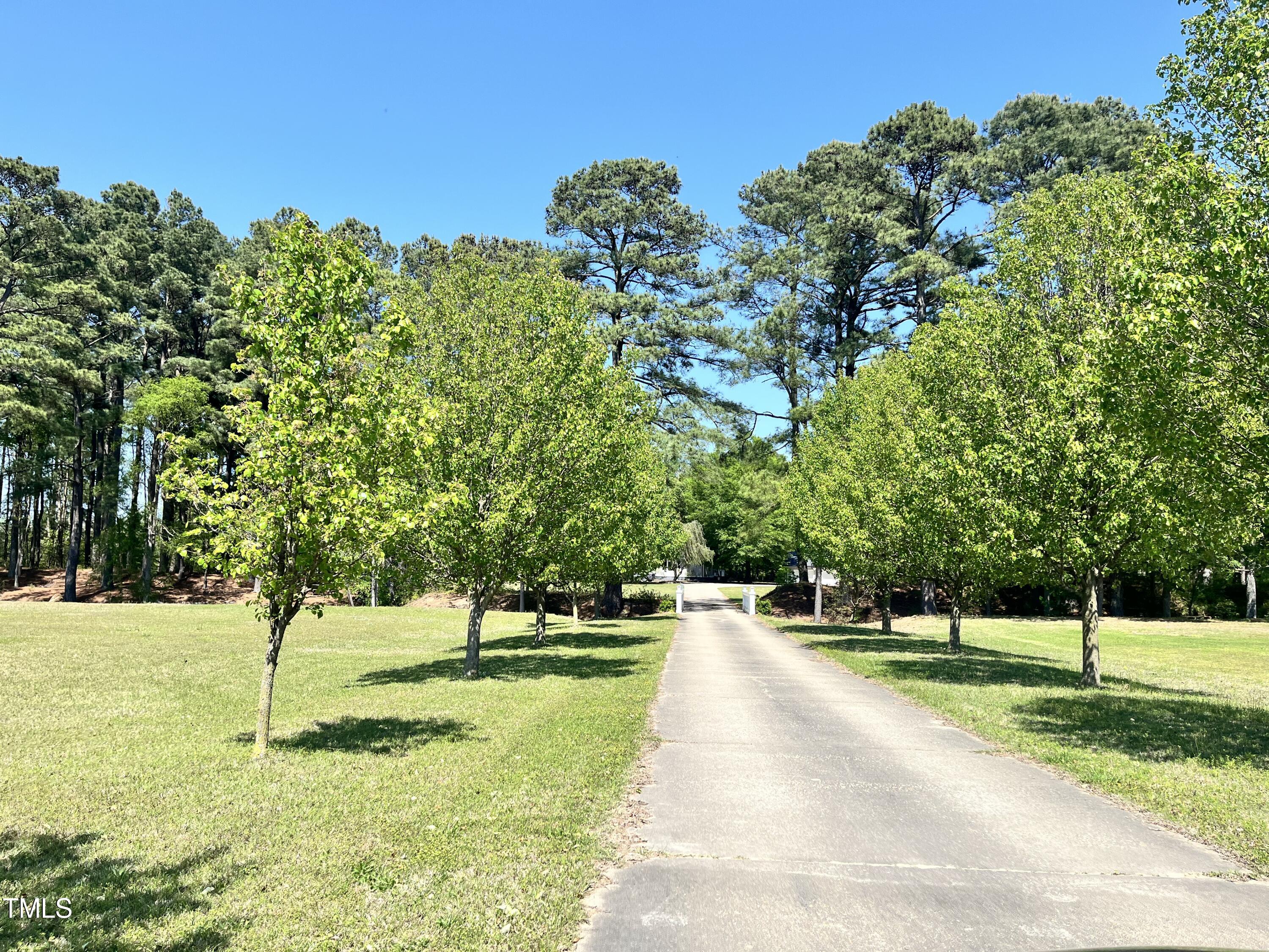 744 Alderman Mill Road Dunn, NC 28334 - Photo 46 of 50 a view of a park with large trees