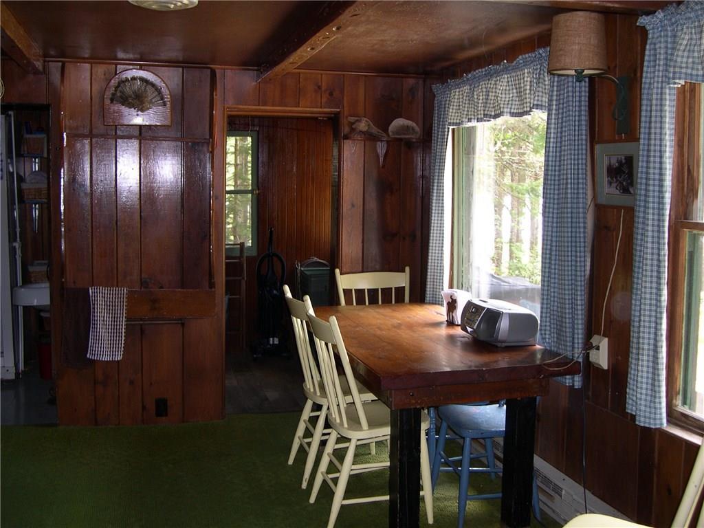 279 Dodge Pond Road, Unit 5 Rangeley, ME 04970 - Photo 12 of 35 eat-in kitchen has water views too