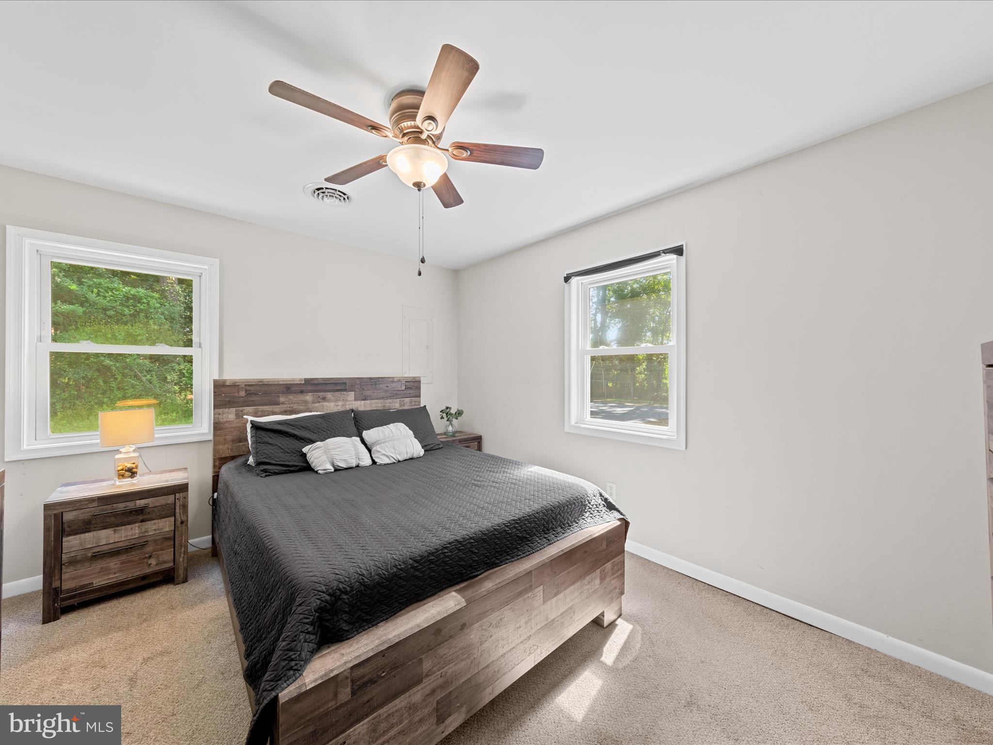 26831 River Road Seaford, DE 19973 - Photo 17 of 41 a bedroom with a bed and a window