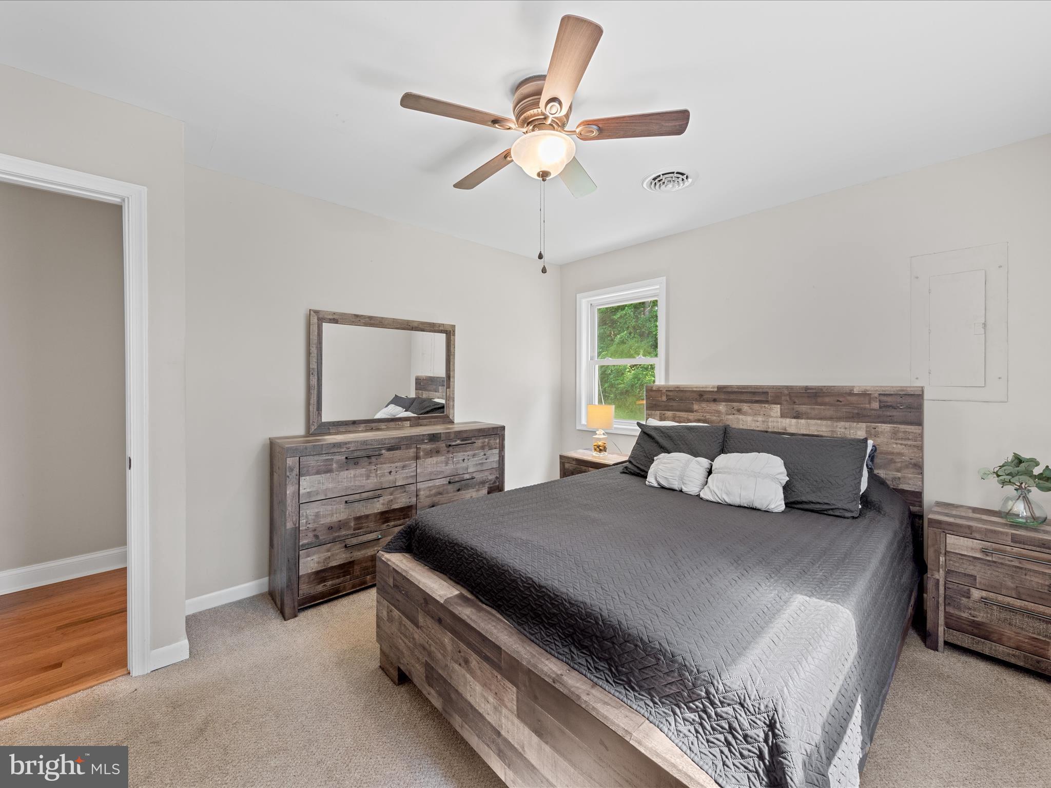 26831 River Road Seaford, DE 19973 - Photo 18 of 41 a bedroom with a bed and dresser