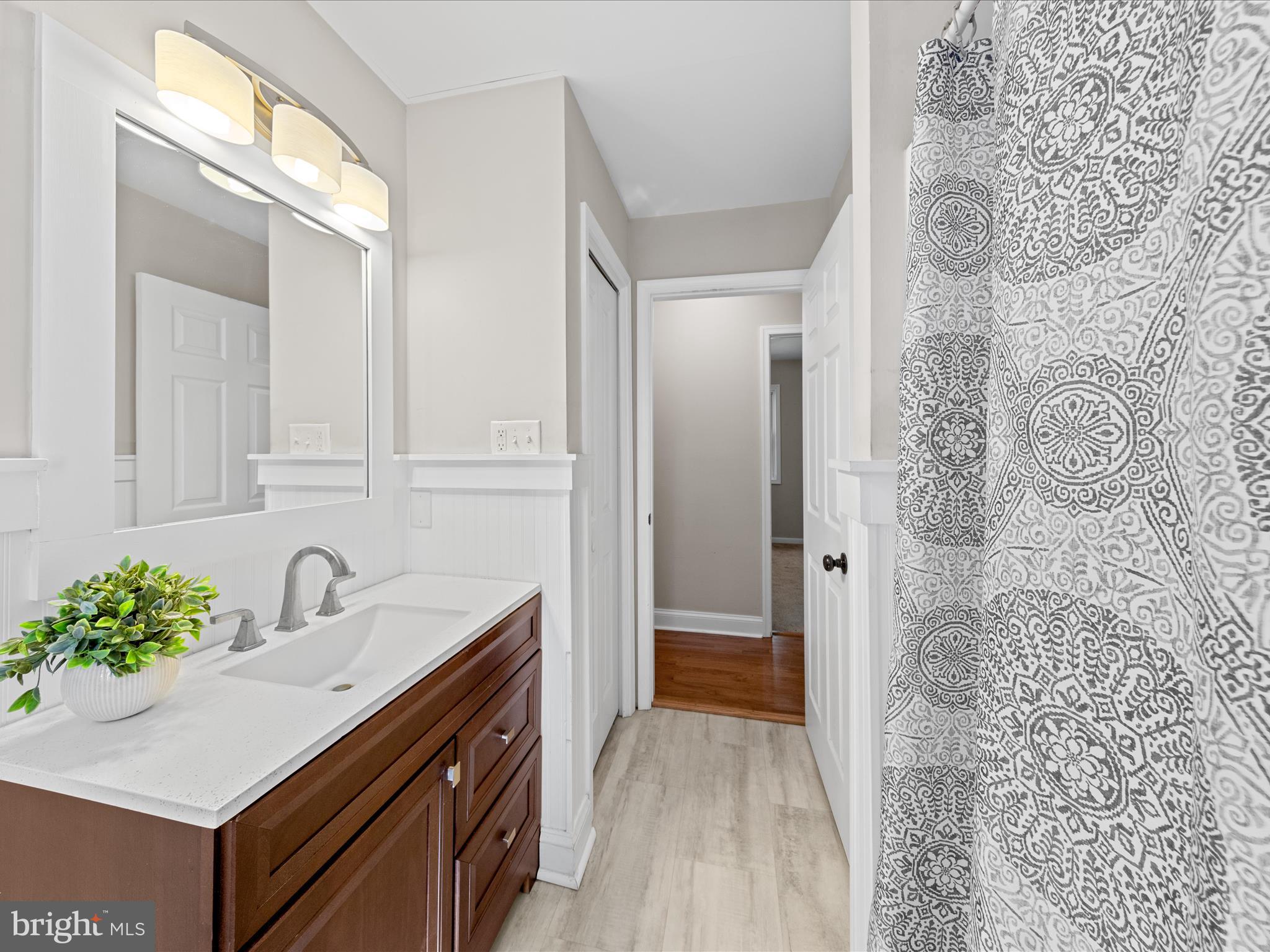 26831 River Road Seaford, DE 19973 - Photo 22 of 41 a bathroom with a sink and a mirror