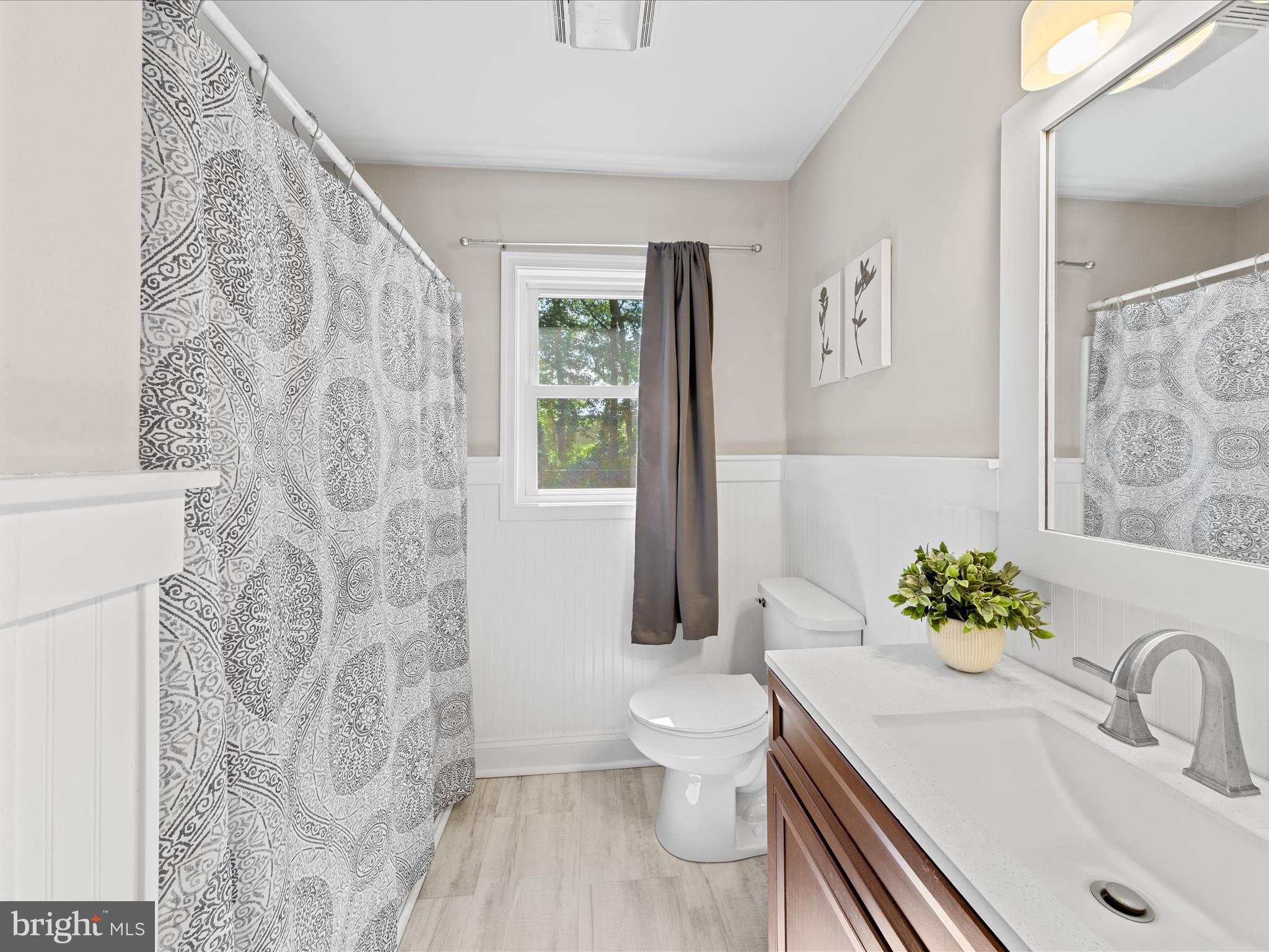 26831 River Road Seaford, DE 19973 - Photo 23 of 41 a bathroom with a sink toilet and shower