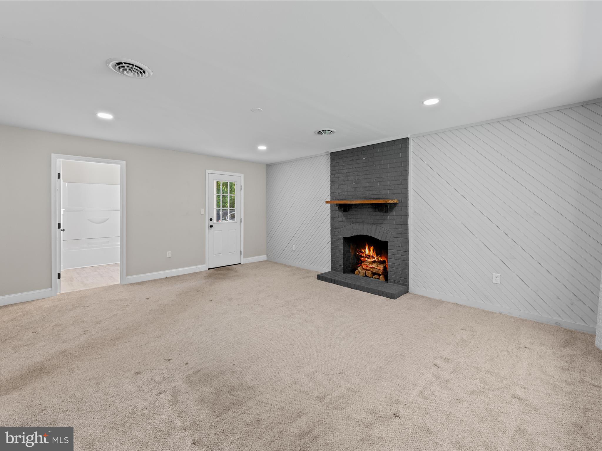 26831 River Road Seaford, DE 19973 - Photo 31 of 41 a view of an empty room with a fireplace