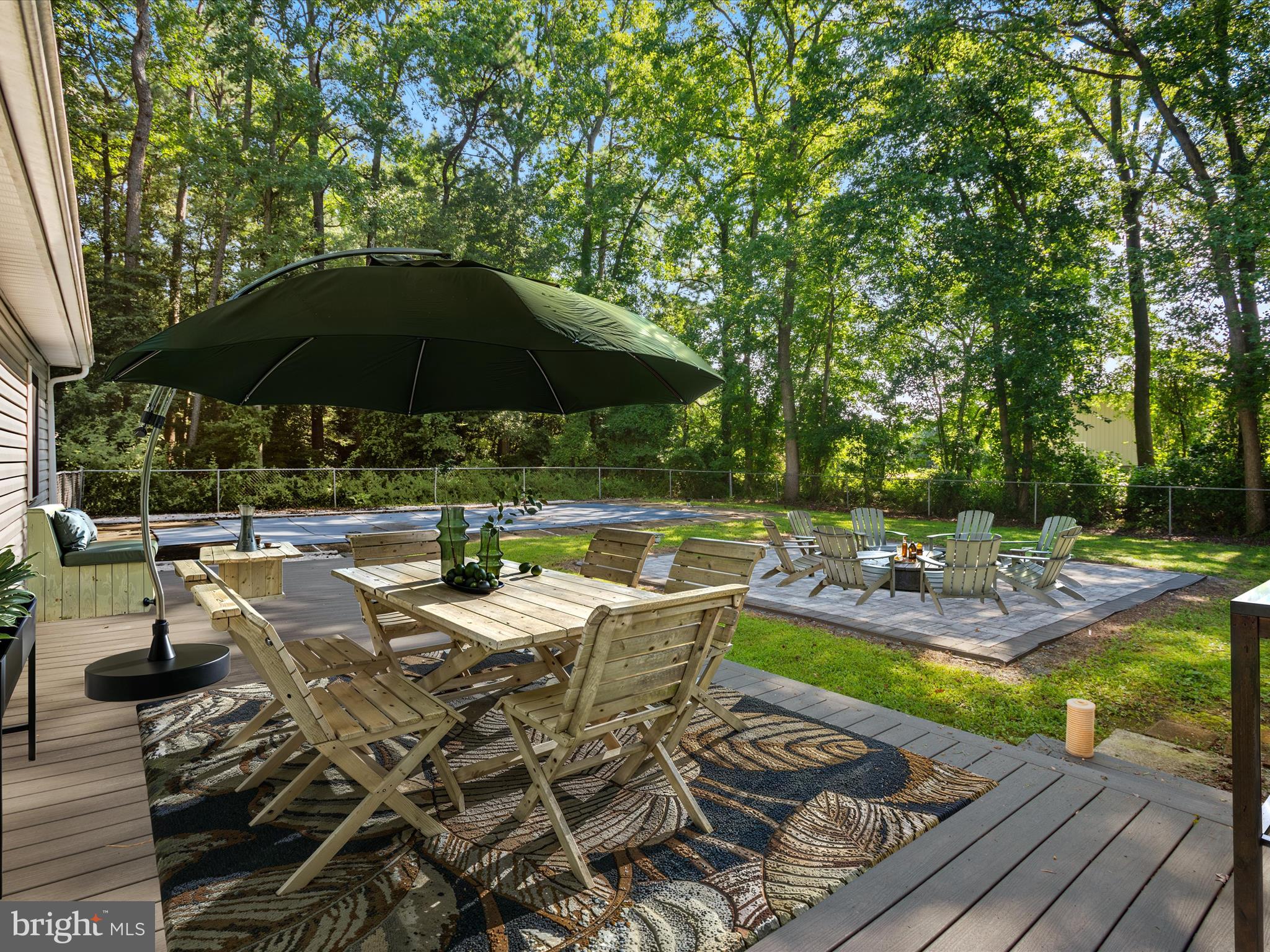 26831 River Road Seaford, DE 19973 - Photo 37 of 41 a view of a backyard with sitting area