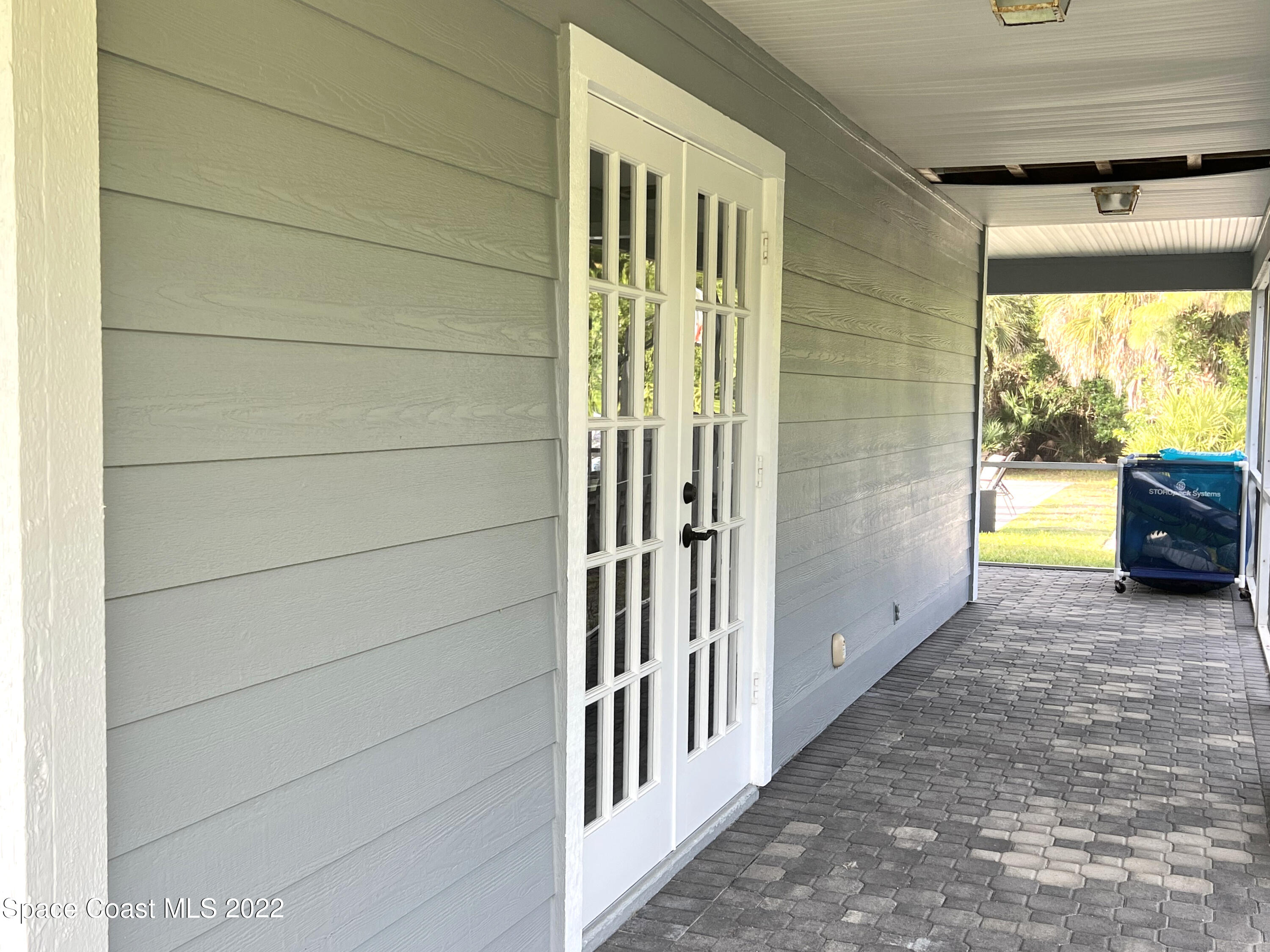 4030 Sparrow Hawk Road Melbourne, FL 32934 - Photo 12 of 46 side porch