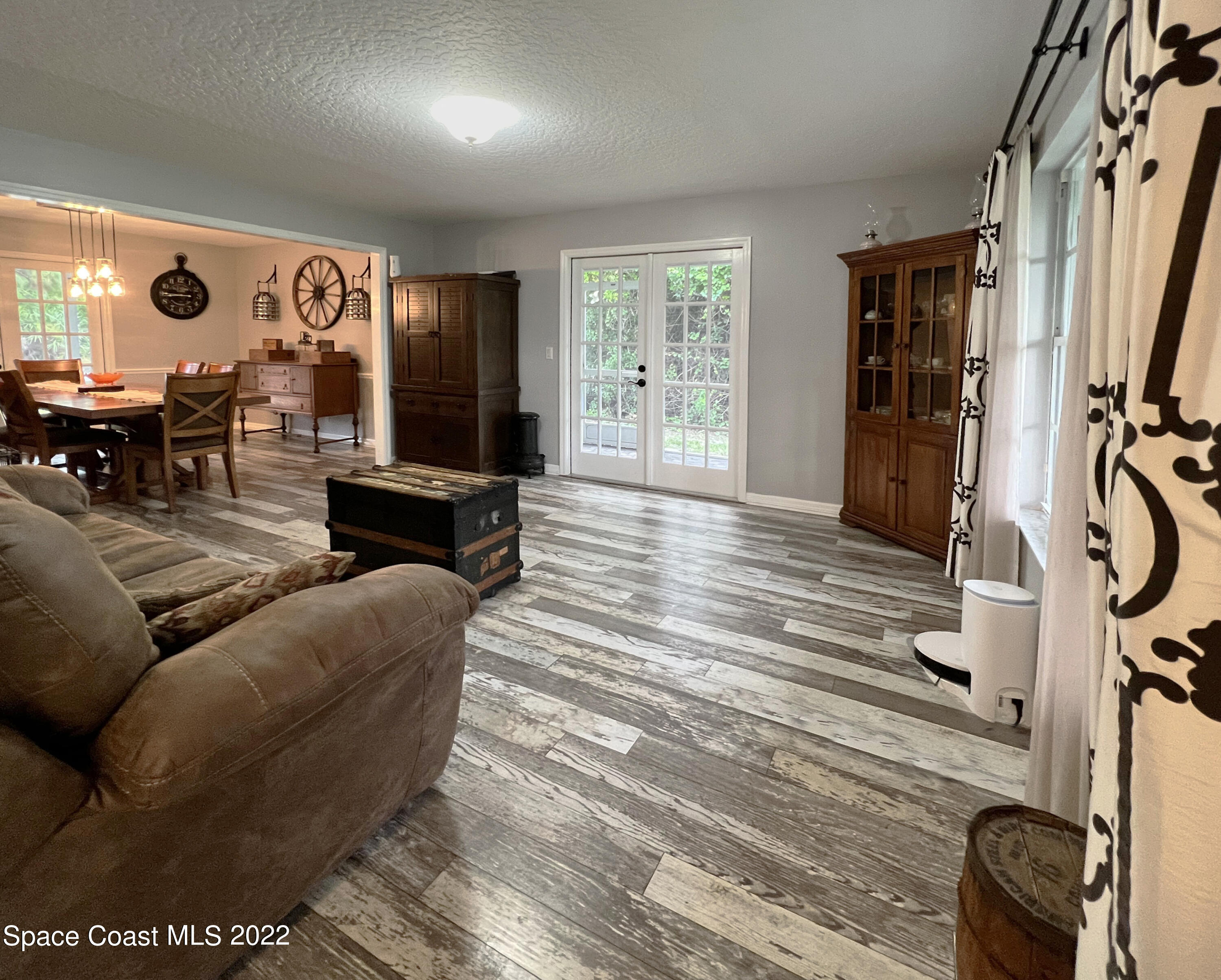 4030 Sparrow Hawk Road Melbourne, FL 32934 - Photo 15 of 46 LivingRoom1