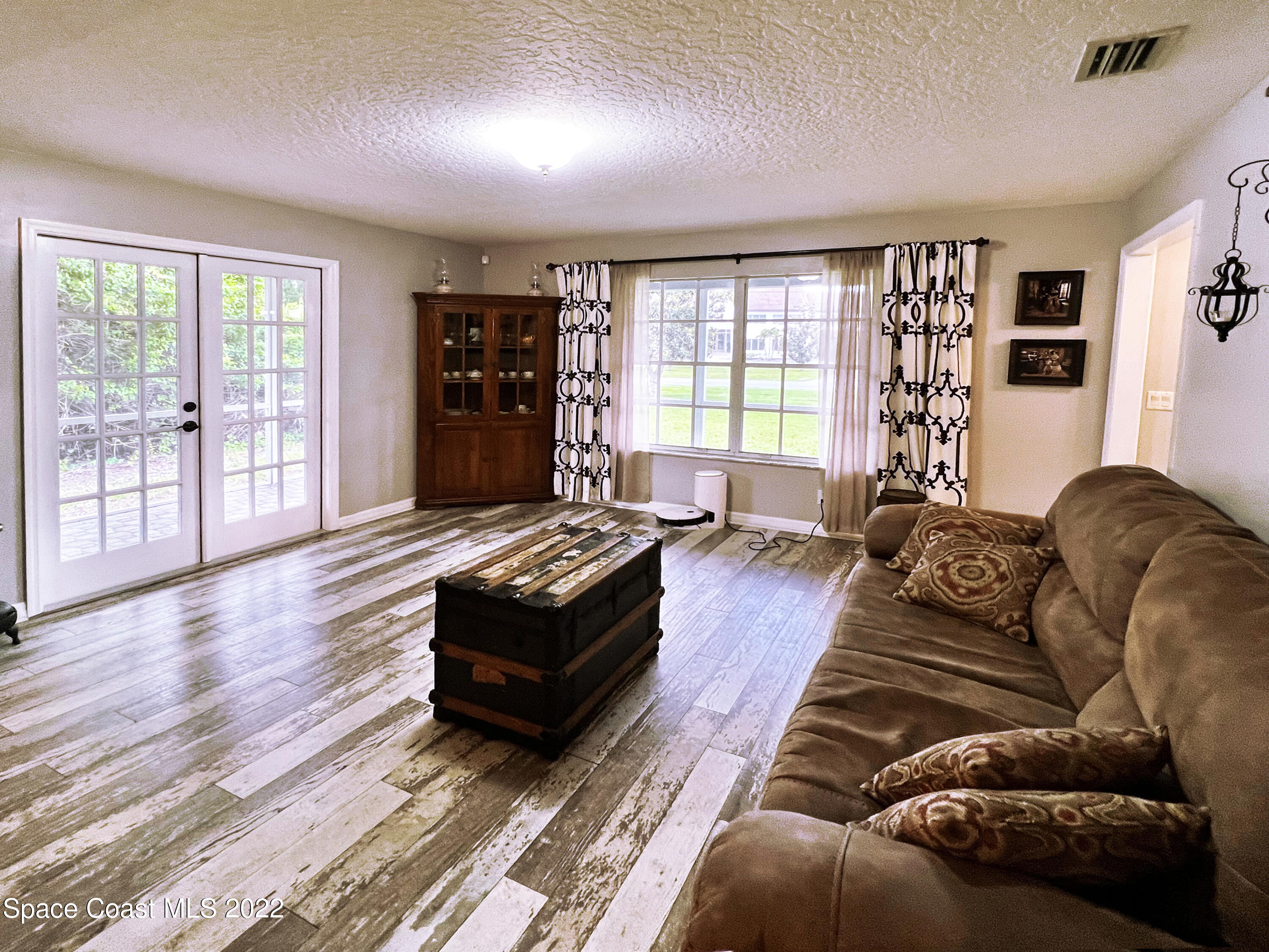 4030 Sparrow Hawk Road Melbourne, FL 32934 - Photo 17 of 46 LivingRoom3