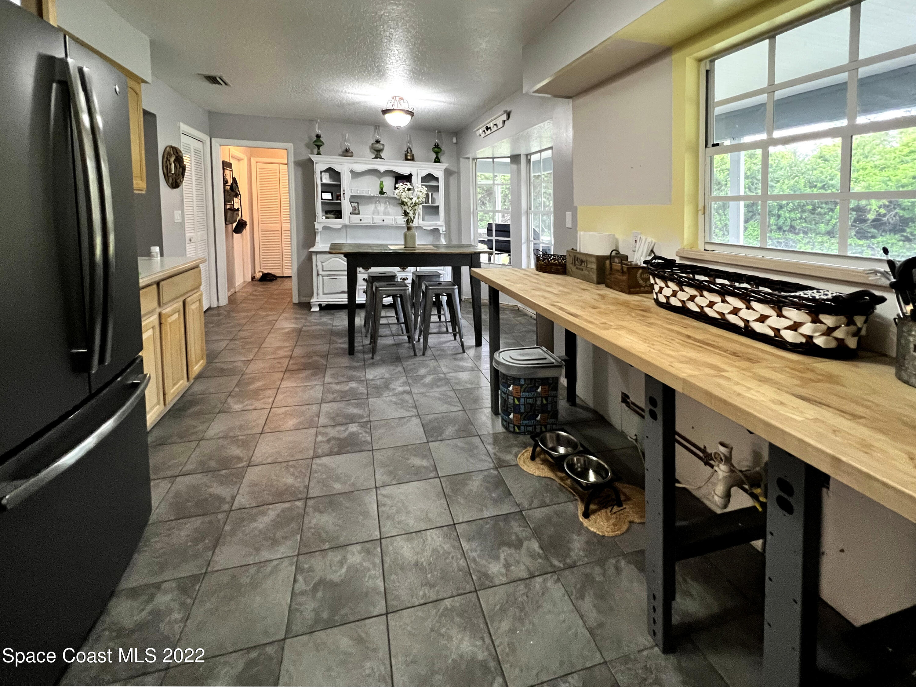 4030 Sparrow Hawk Road Melbourne, FL 32934 - Photo 21 of 46 KitchenDining