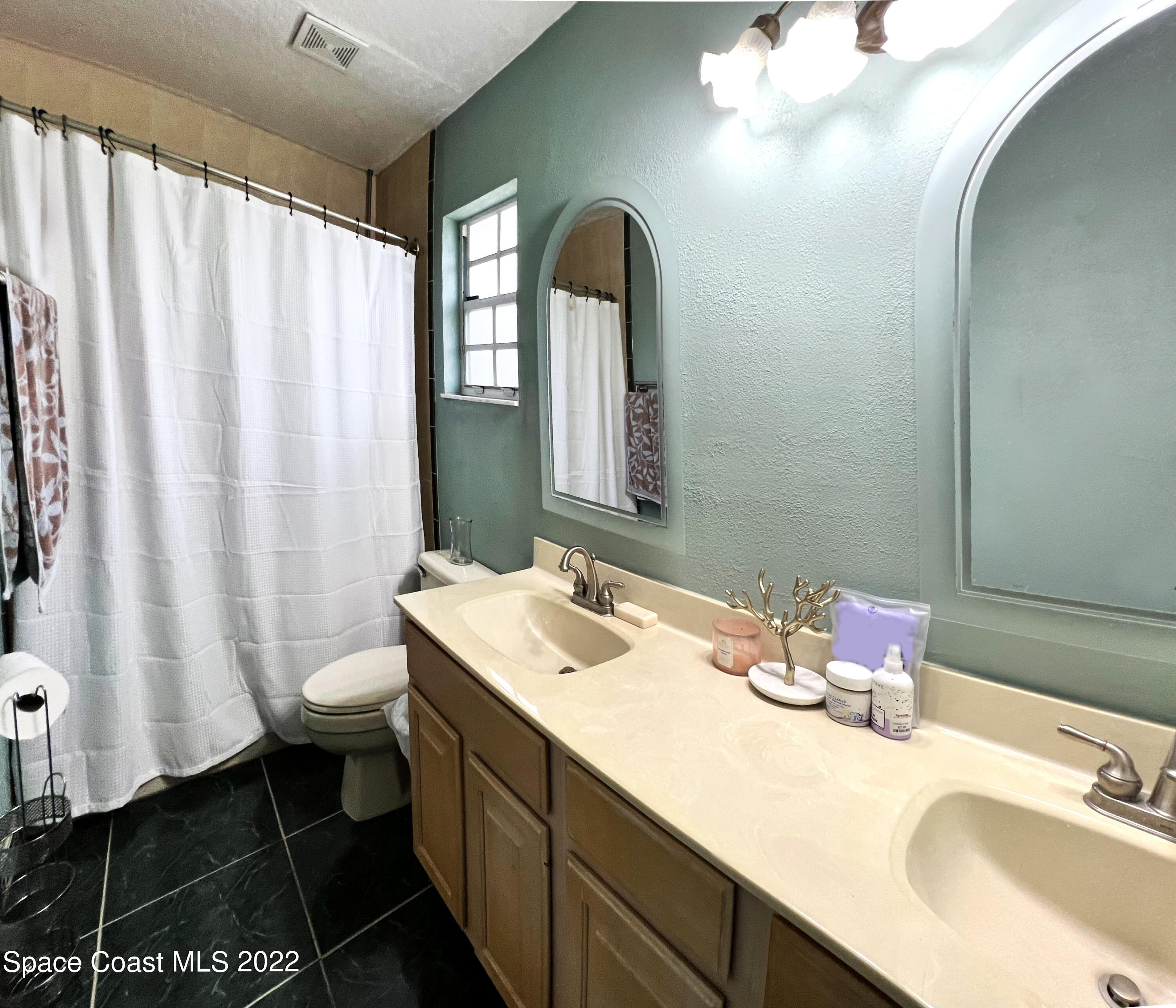 4030 Sparrow Hawk Road Melbourne, FL 32934 - Photo 38 of 46 UpstairsBath