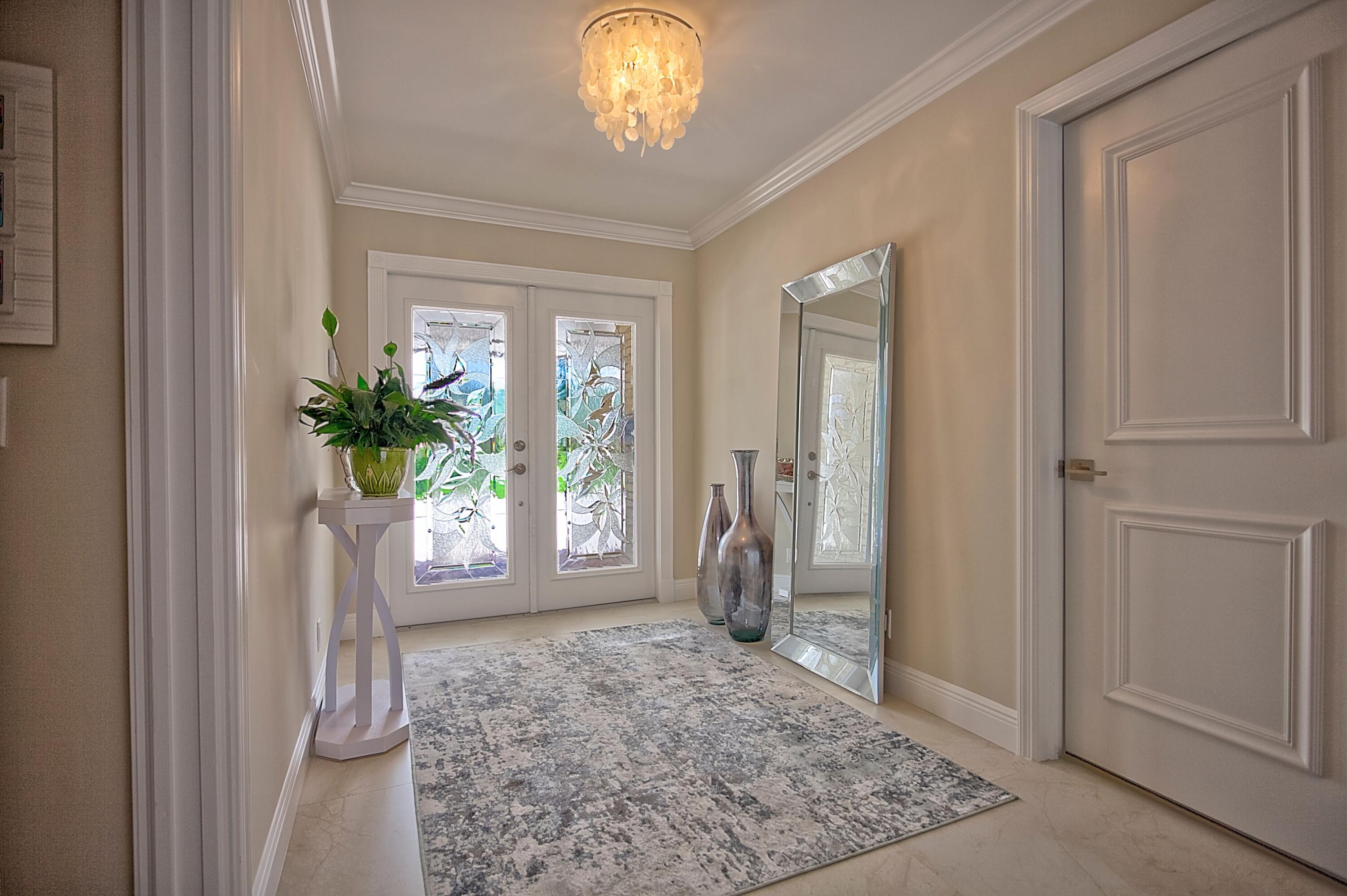 455 South Country Club Drive Atlantis, FL 33462 - Photo 2 of 18 Entry Way