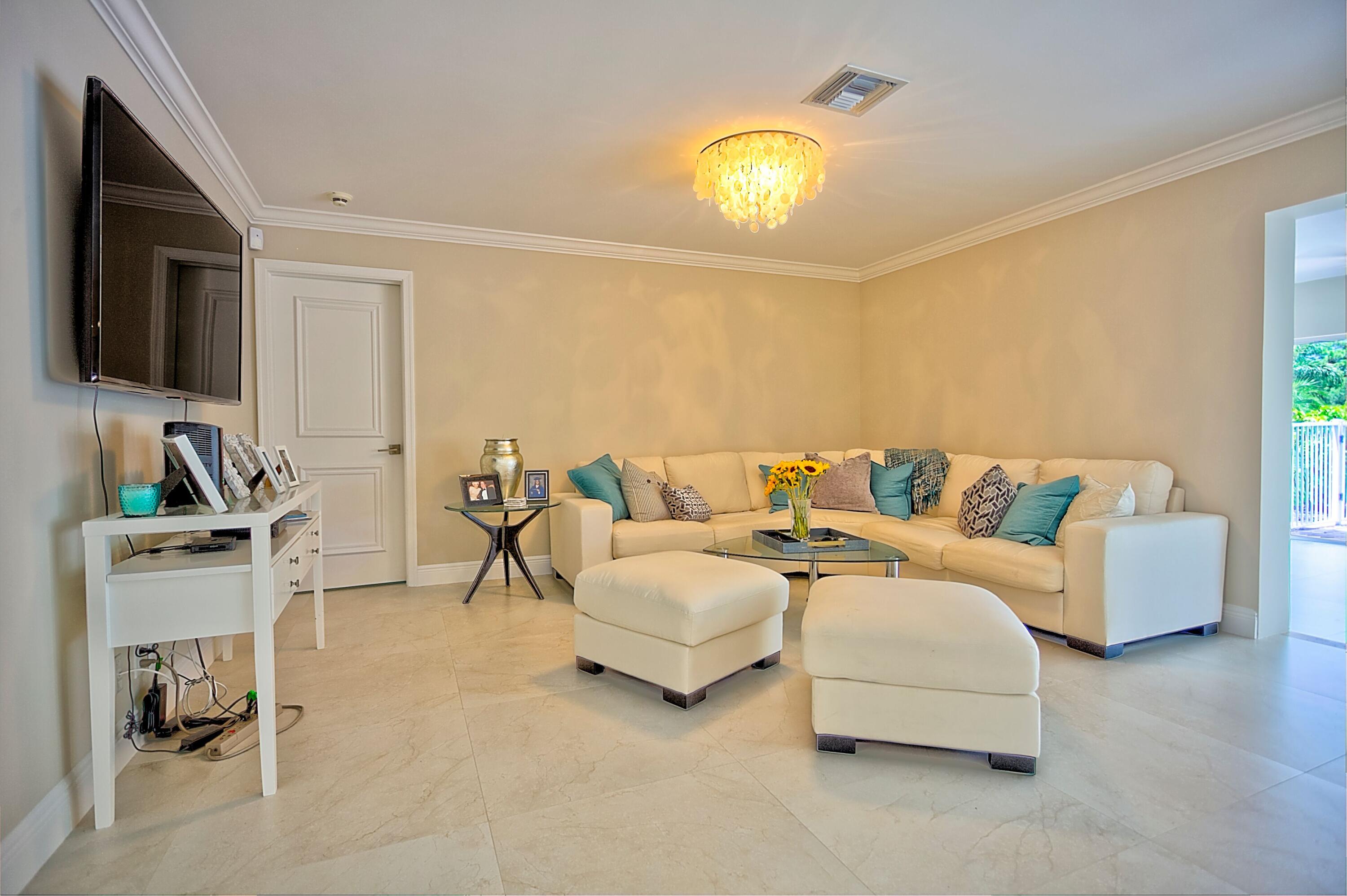 455 South Country Club Drive Atlantis, FL 33462 - Photo 6 of 18 Living Room 1