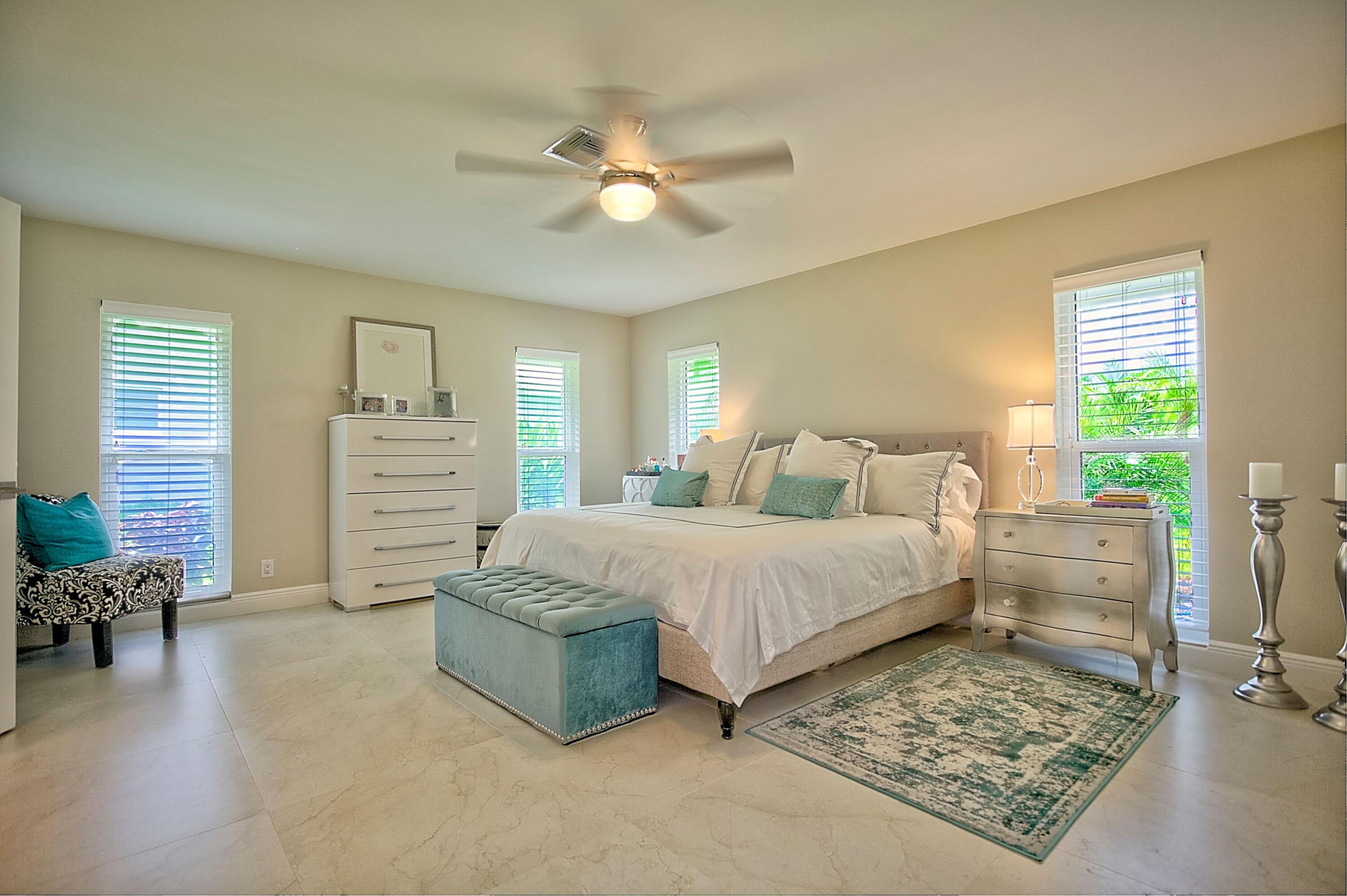 455 South Country Club Drive Atlantis, FL 33462 - Photo 9 of 18 Master Bedroom