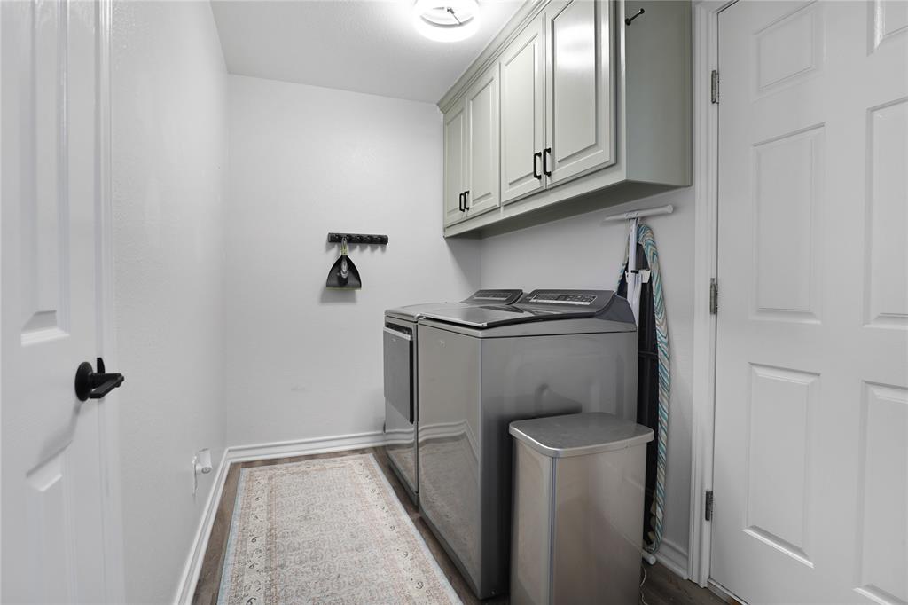 271 East Houston Street Van Alstyne, TX 75495 - Photo 28 of 40 a view of hallway with washer and dryer