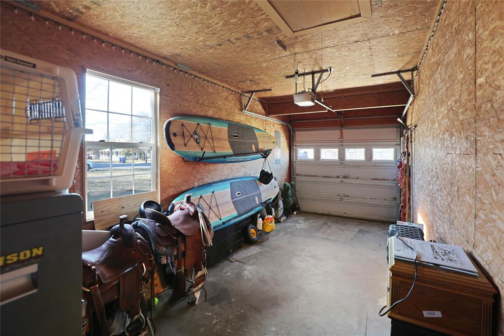 271 East Houston Street Van Alstyne, TX 75495 - Photo 29 of 40 a view of room with window and furniture