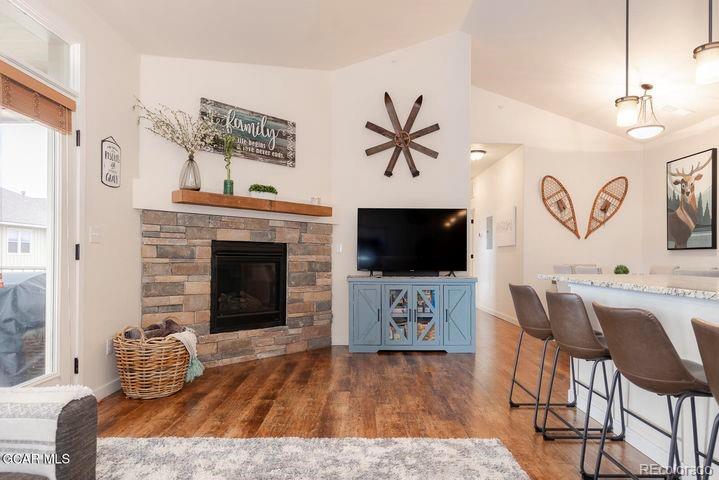 164 Village Road, Unit H304 Granby, CO 80446 - Photo 11 of 50 a living room with furniture and a flat screen tv