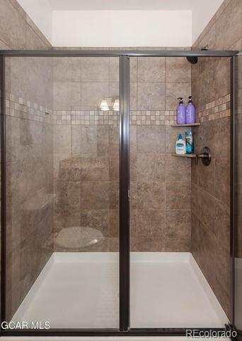 164 Village Road, Unit H304 Granby, CO 80446 - Photo 29 of 50 a bathroom with a shower and a sink