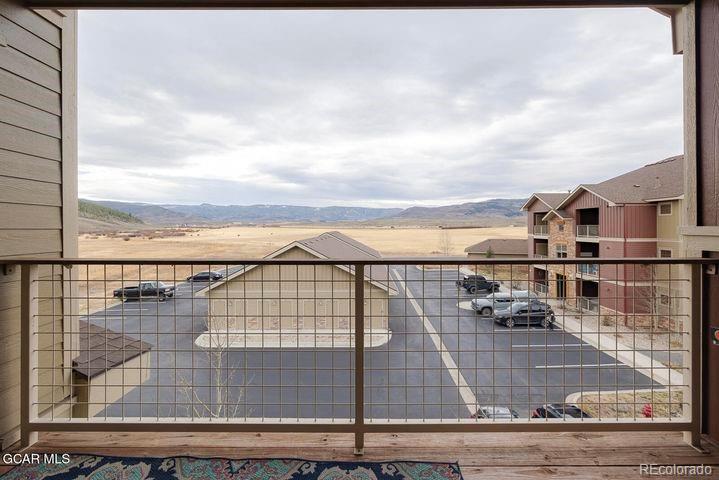 164 Village Road, Unit H304 Granby, CO 80446 - Photo 33 of 50 a view of a terrace with wooden floor