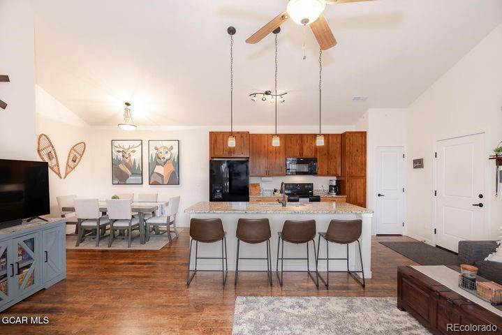 164 Village Road, Unit H304 Granby, CO 80446 - Photo 37 of 50 a view of living room with furniture and a flat screen tv