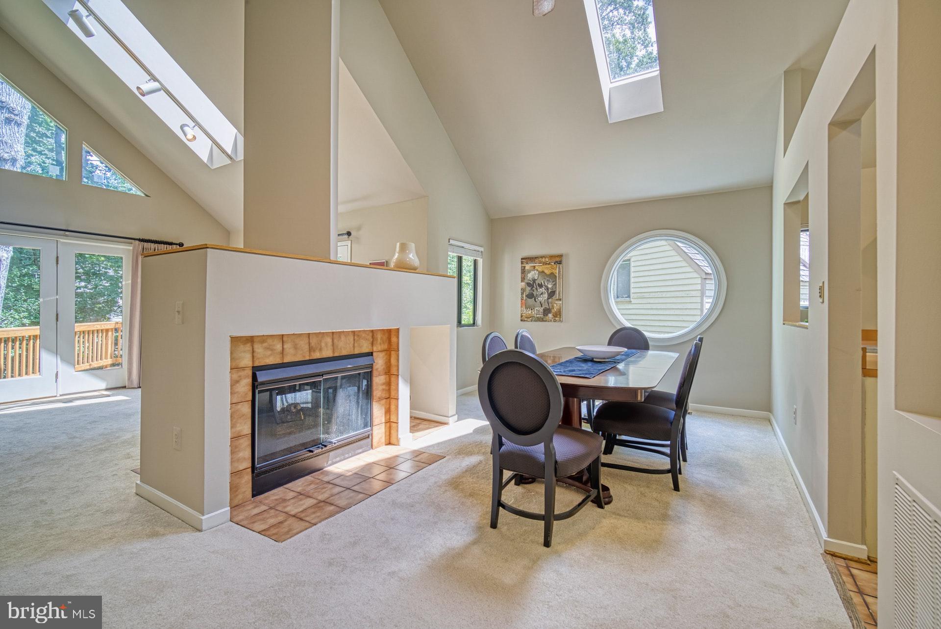 11517 Turnbridge Lane Reston, VA 20194 - Photo 3 of 45 Dining Room With Two Sided Fireplace, Skylights