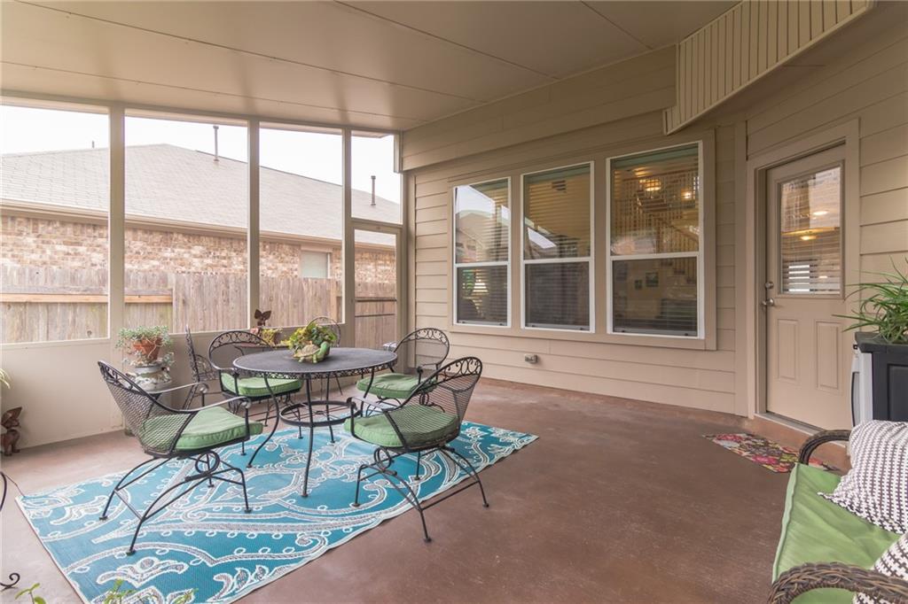 252 Pond View Pass Buda, TX 78610 - Photo 26 of 37 Sunroom with outdoor dining space