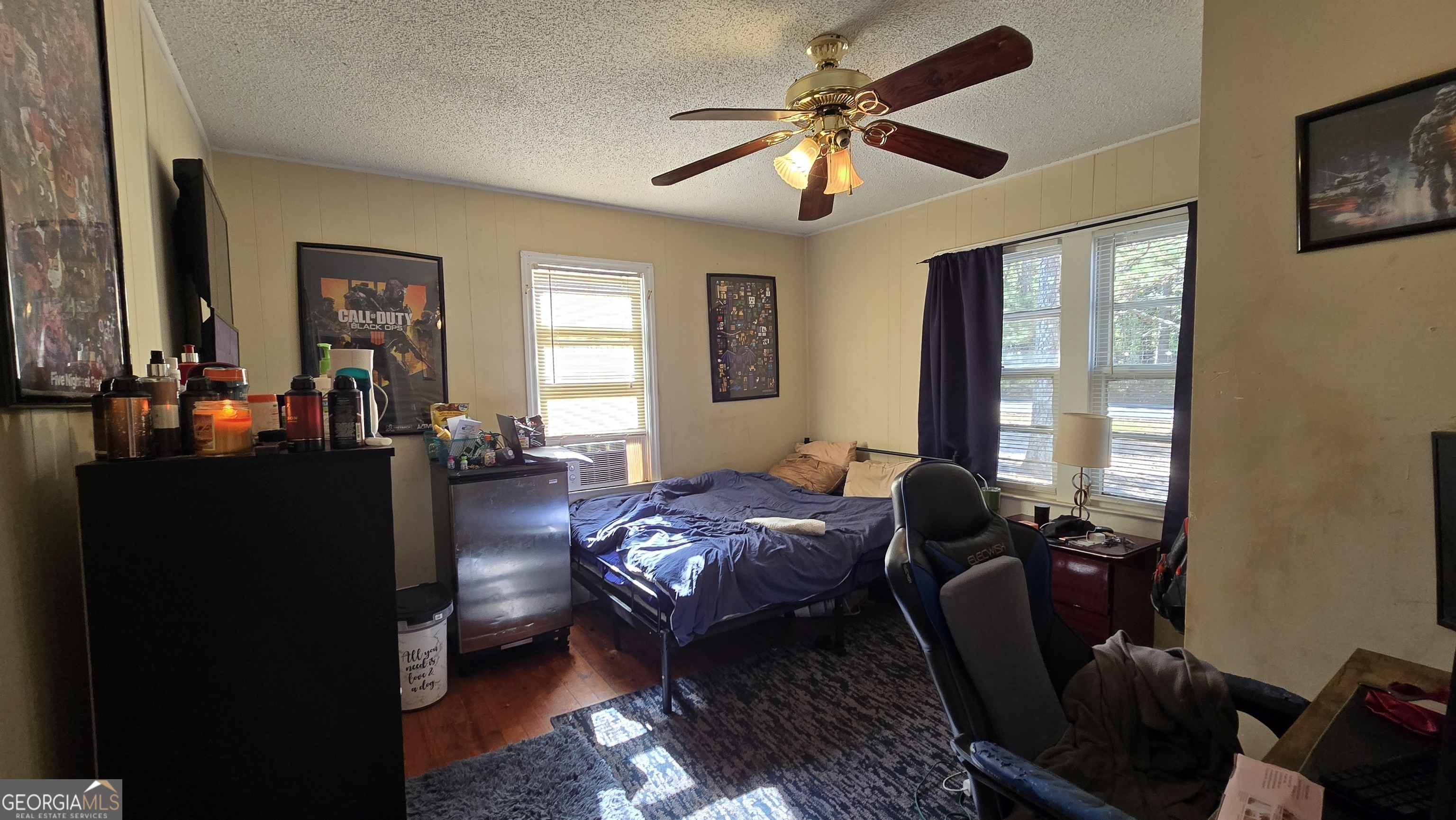 377 Dock Hyde Road Carrollton, GA 30116 - Photo 28 of 31 a bed room with furniture and a window