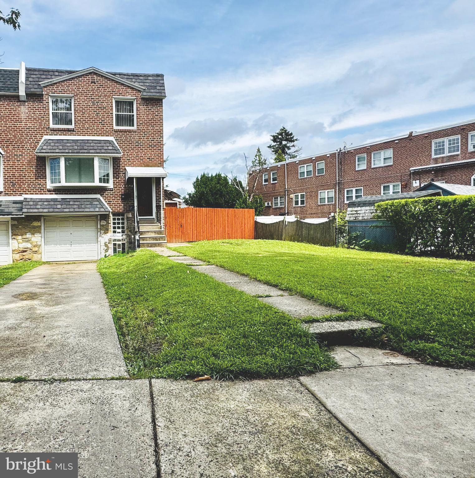 3627 Newberry Road Philadelphia, PA 19154 - Photo 2 of 28 a front view of a house with garden