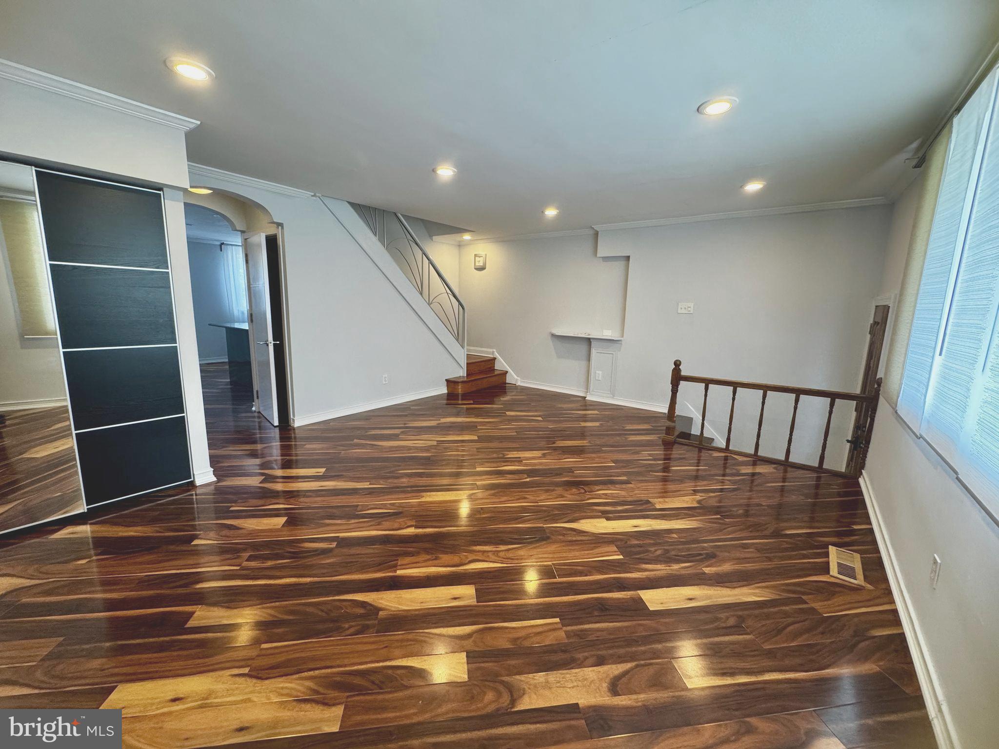 3627 Newberry Road Philadelphia, PA 19154 - Photo 9 of 28 a view of a livingroom with wooden floor and staircase