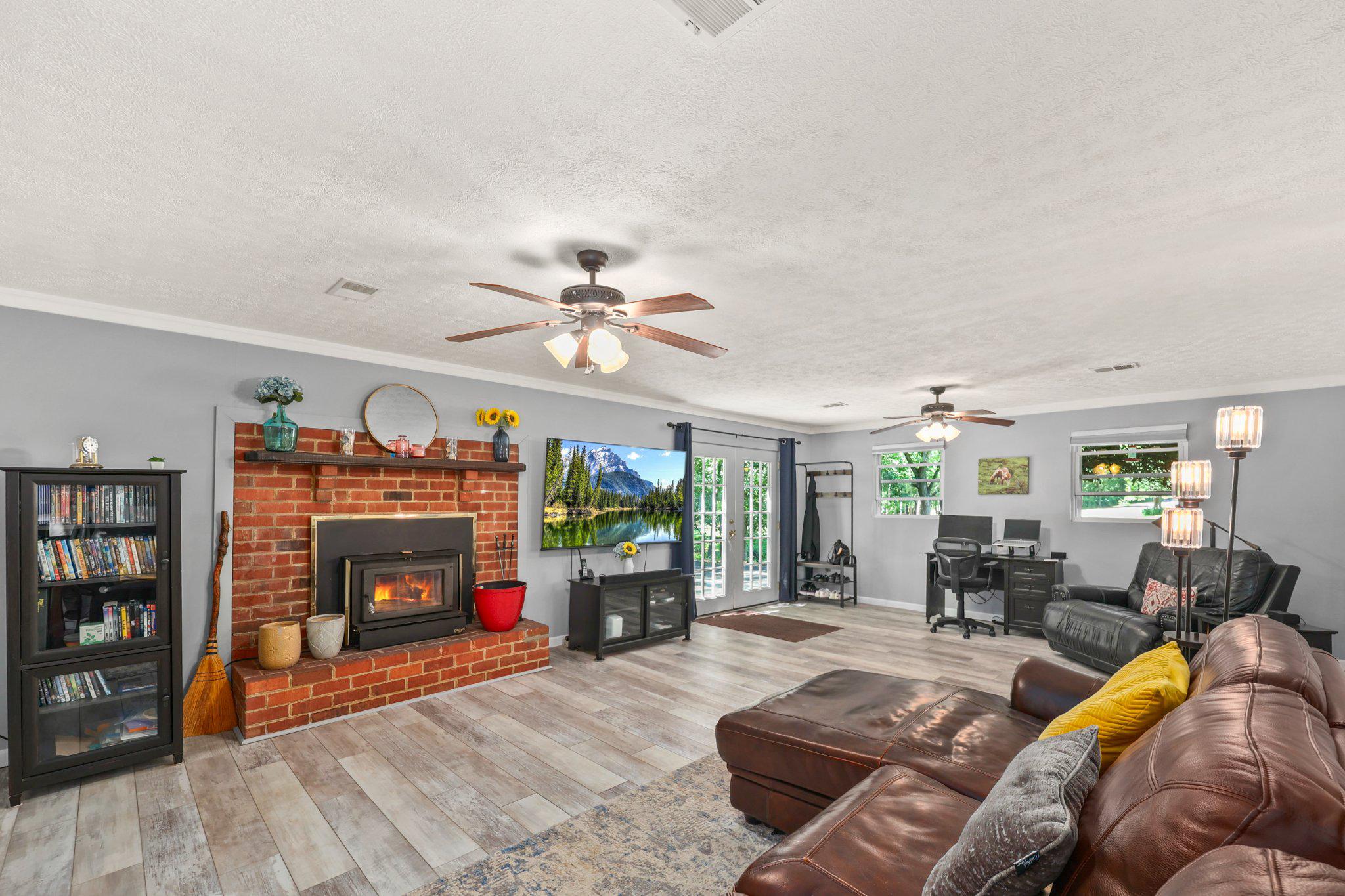 7357 Auburn Mill Road Warrenton, VA 20187 - Photo 18 of 35 Finished Walk-out basement w/brick FP-wood insert