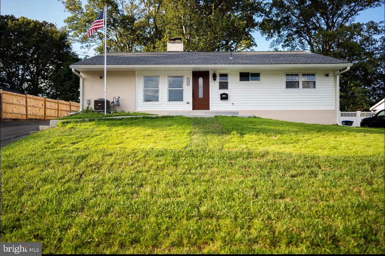 a front view of a house with swimming pool
